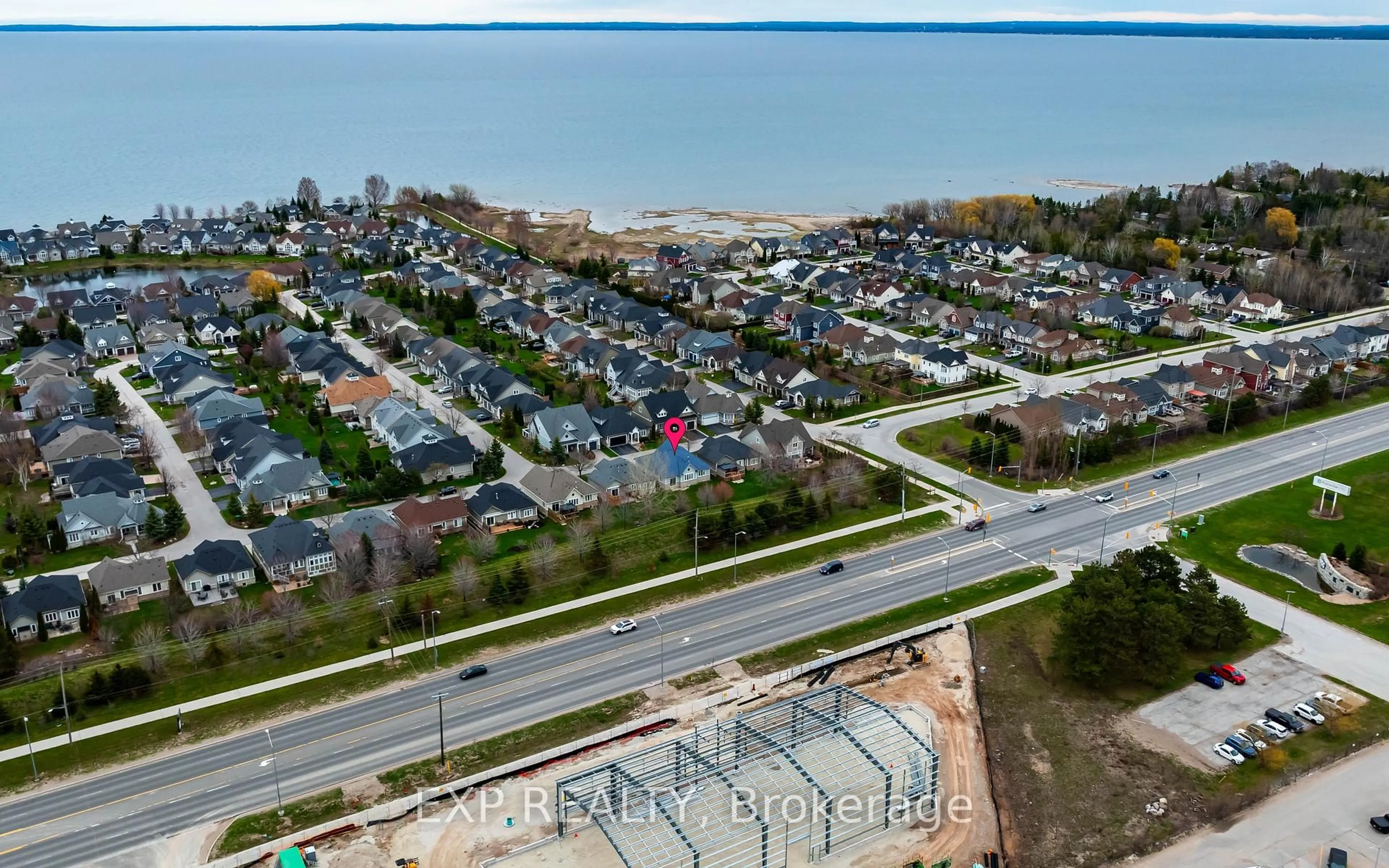 A pic from outside/outdoor area/front of a property/back of a property/a pic from drone, street for 8 Clubhouse Dr, Collingwood Ontario L9Y 4Z6