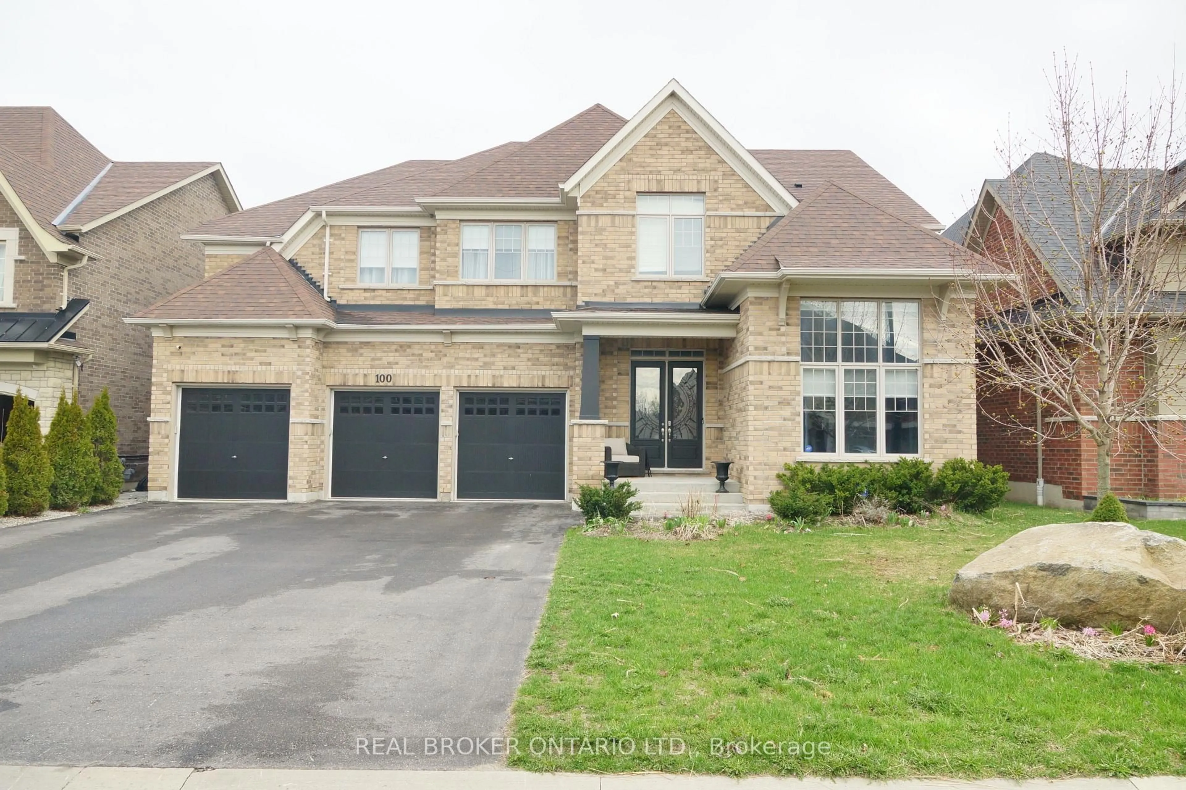Home with brick exterior material, street for 100 Trail Blvd, Springwater Ontario L9X 0S7