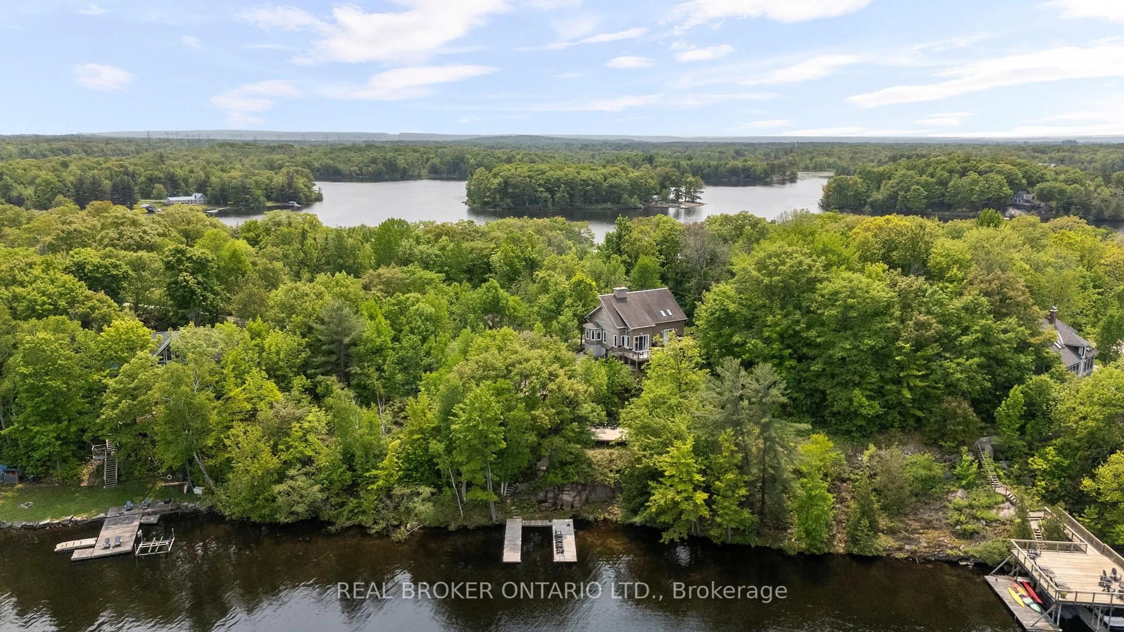 A pic from outside/outdoor area/front of a property/back of a property/a pic from drone, water/lake/river/ocean view for 2043 Beman Point Lane, Severn Ontario L0K 1E0