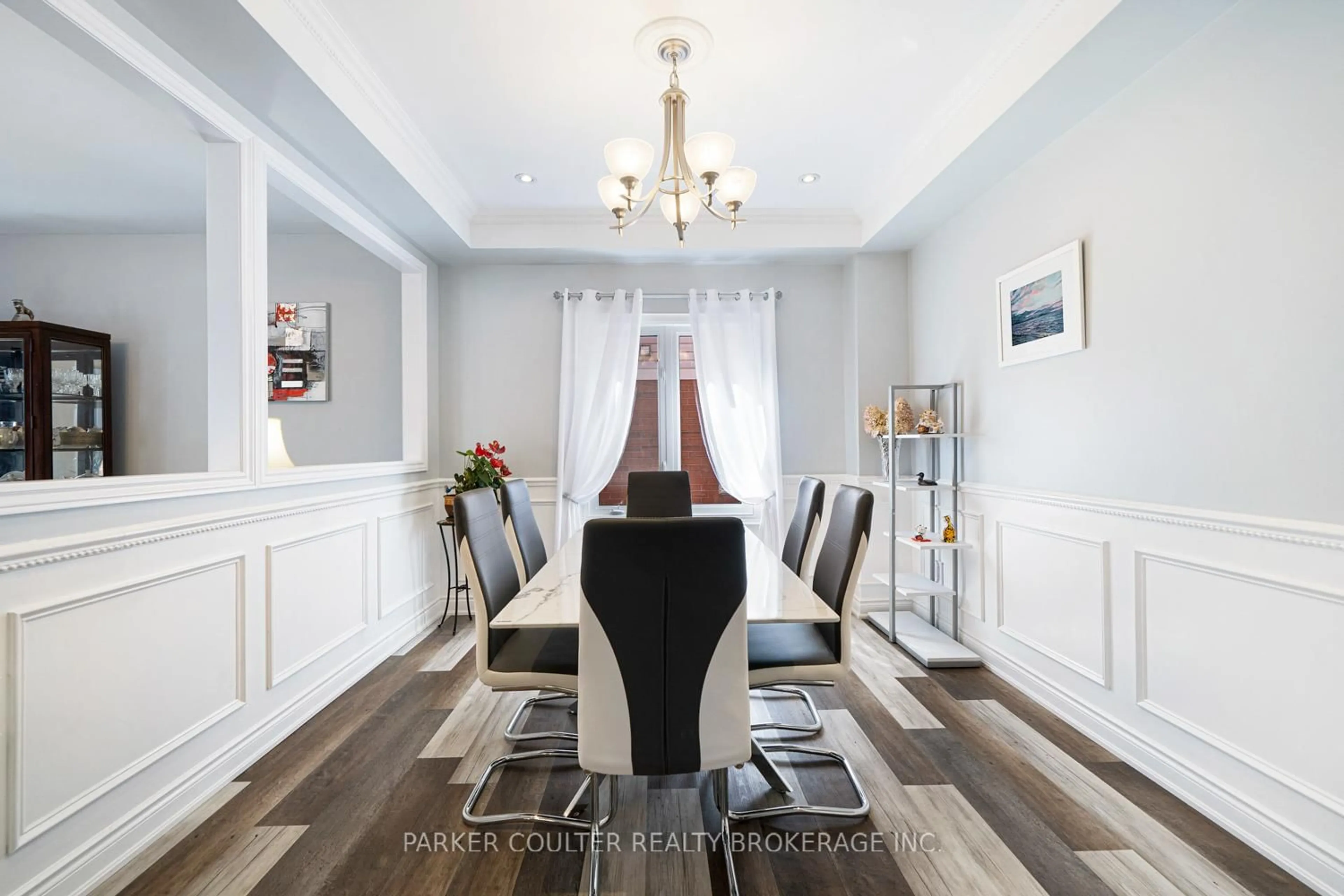 Dining room, wood/laminate floor for 117 Winchester Terr, Barrie Ontario L4M 0B3