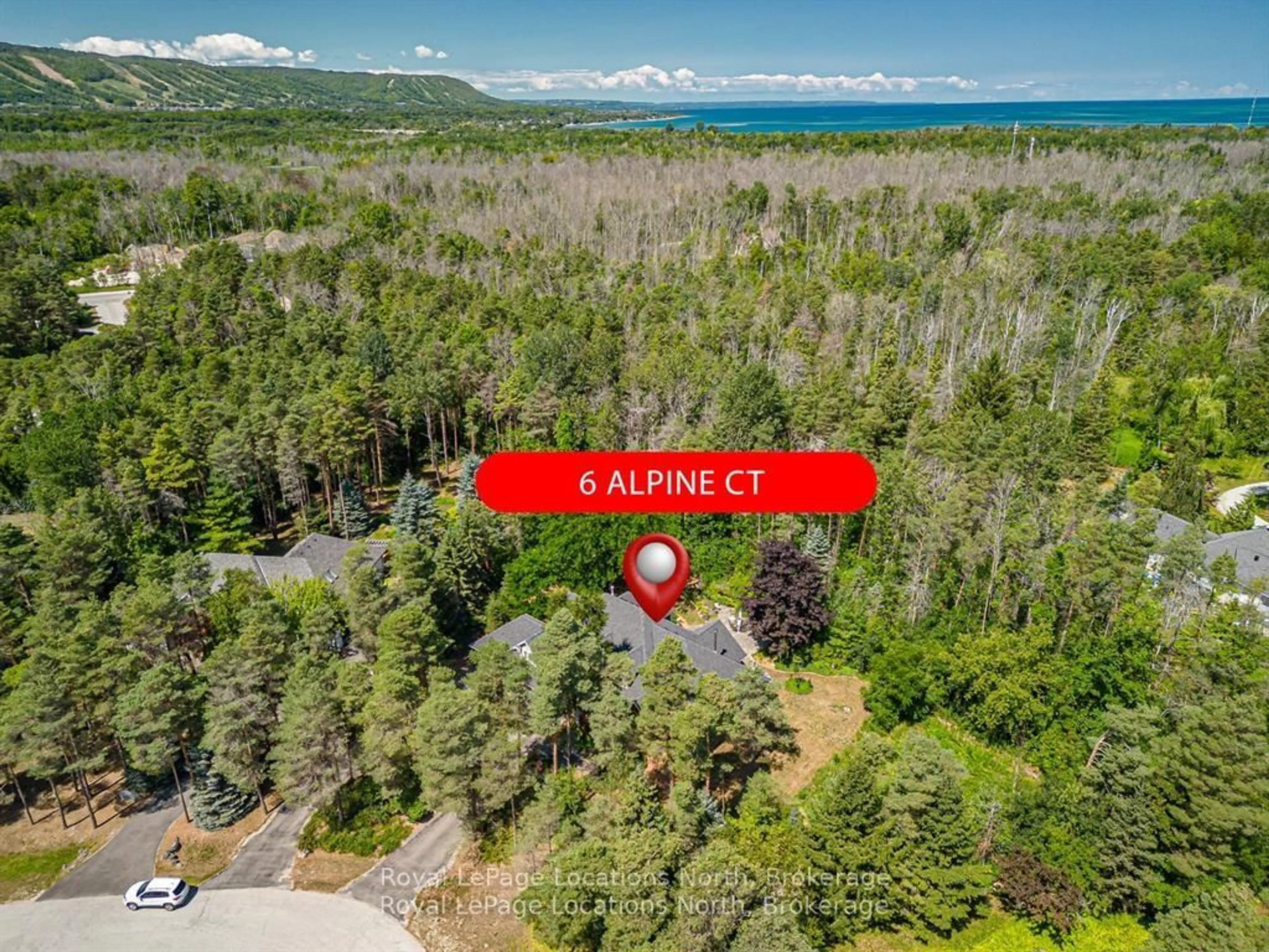 A pic from outside/outdoor area/front of a property/back of a property/a pic from drone, forest/trees view for 6 Alpine Crt, Collingwood Ontario L9Y 4W7