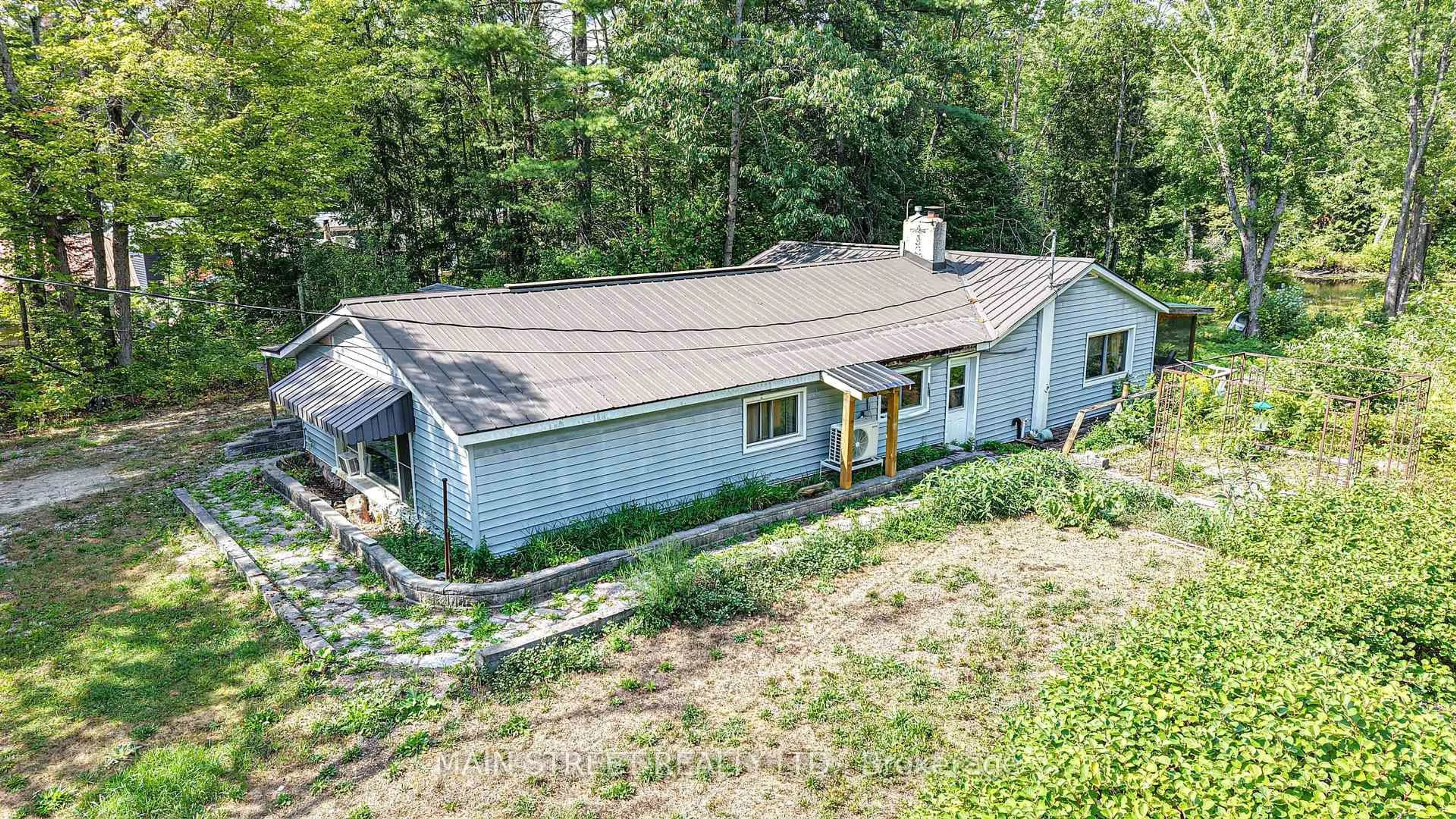 A pic from outside/outdoor area/front of a property/back of a property/a pic from drone, unknown for 6583 Pioneer Village Line, Ramara Ontario L0K 1W0