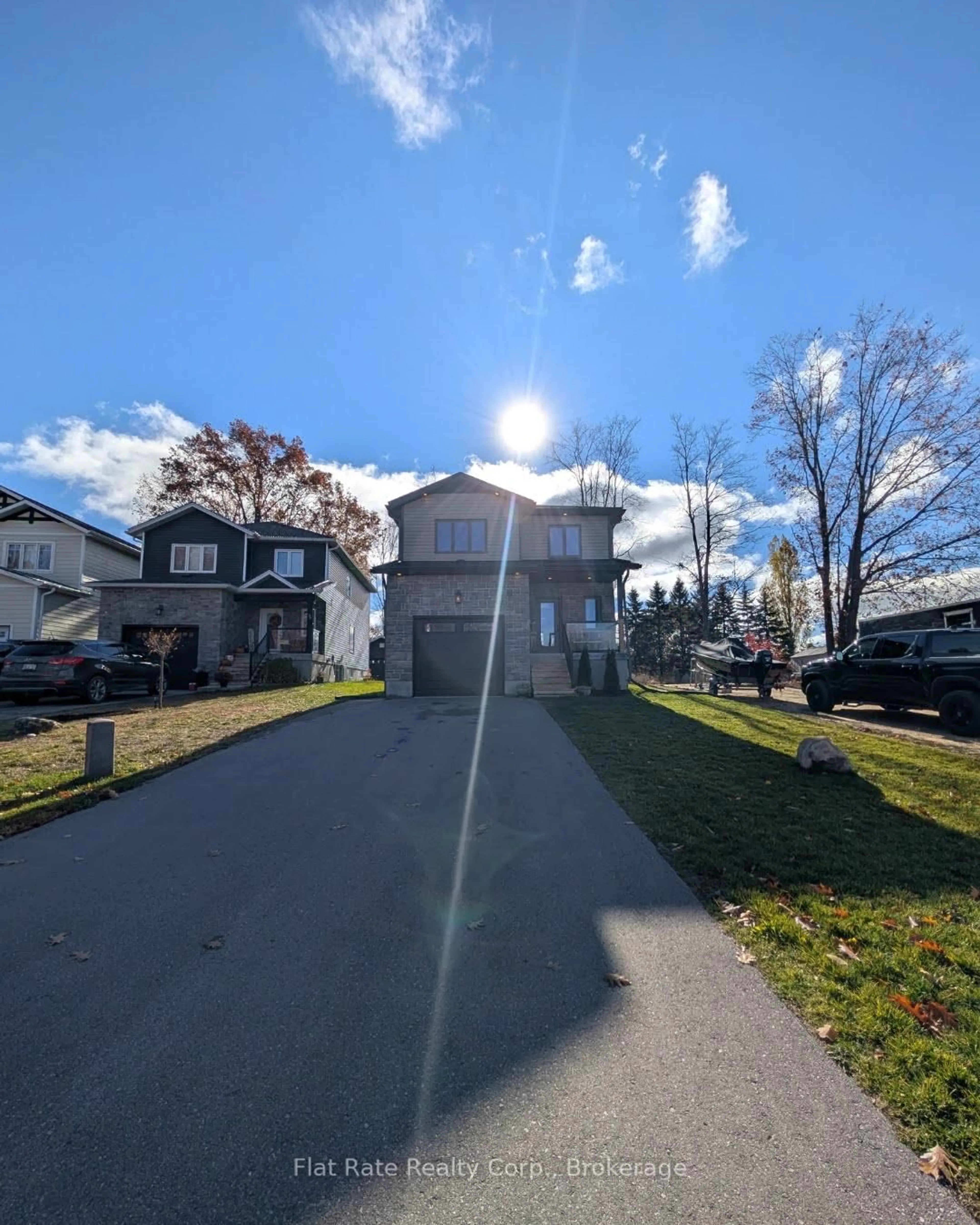 A pic from outside/outdoor area/front of a property/back of a property/a pic from drone, street for 38 Payette Dr, Penetanguishene Ontario L9M 1H5