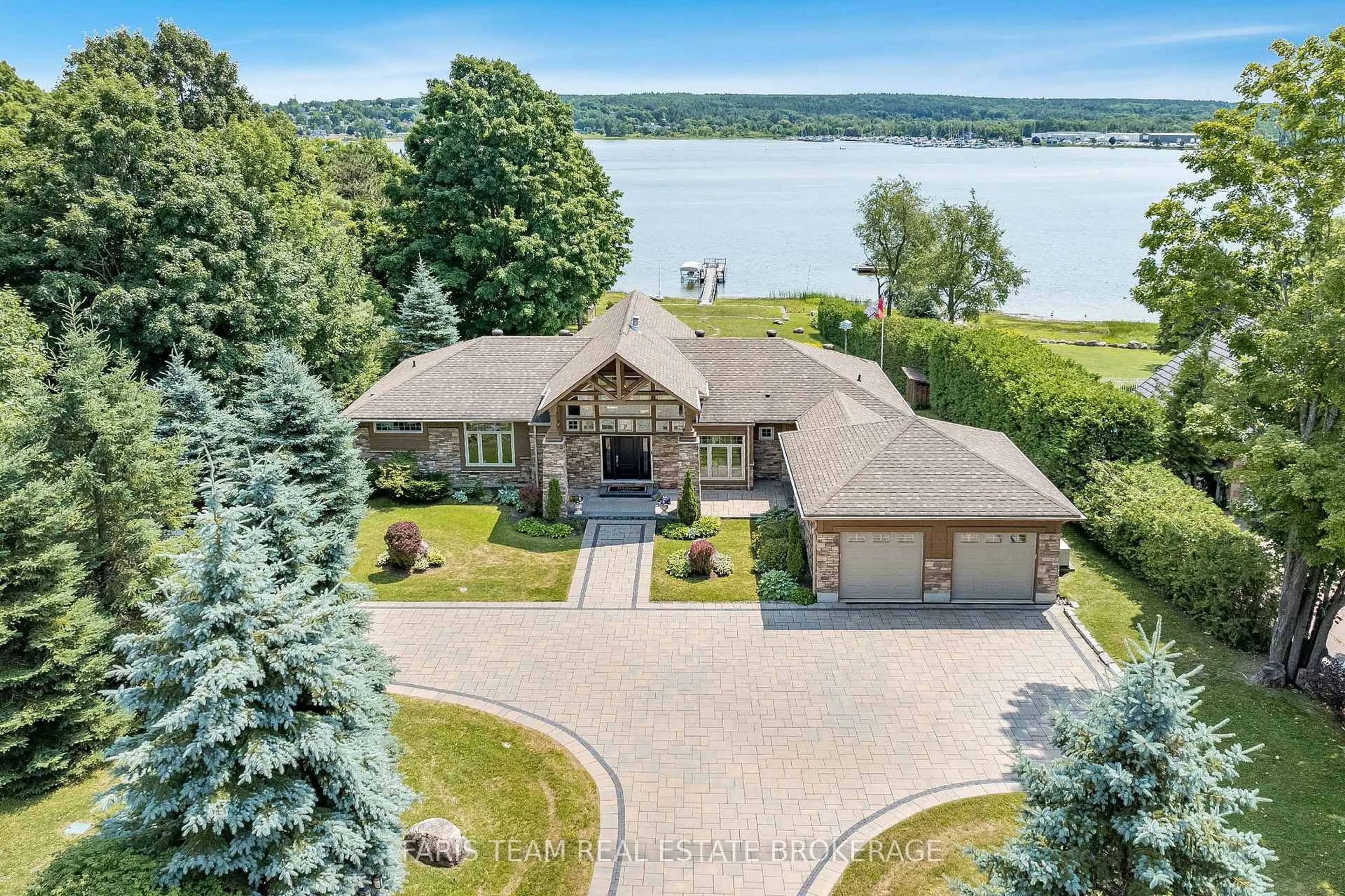 A pic from outside/outdoor area/front of a property/back of a property/a pic from drone, water/lake/river/ocean view for 219 Champlain Rd, Penetanguishene Ontario L9M 1S2
