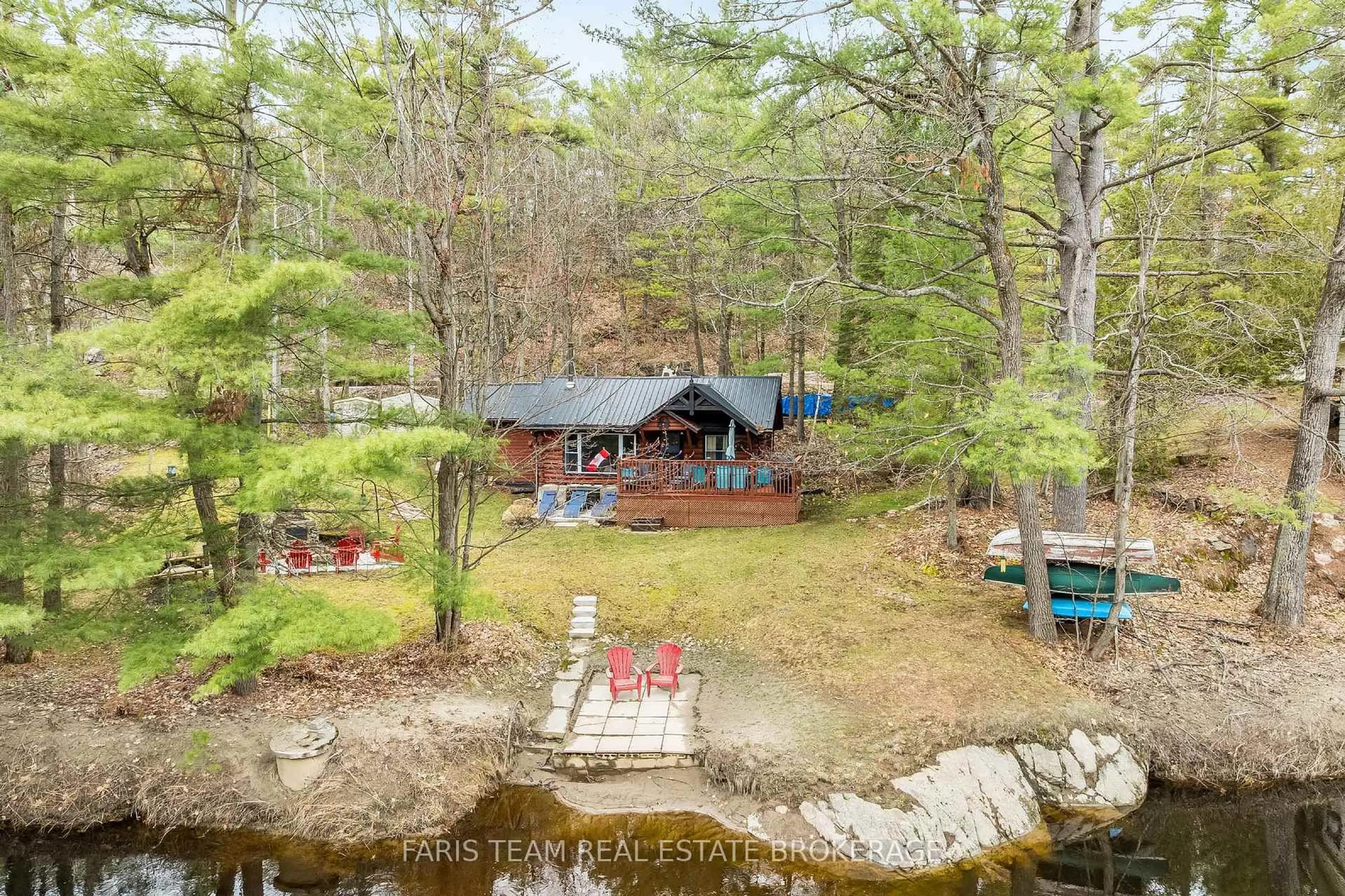 A pic from outside/outdoor area/front of a property/back of a property/a pic from drone, water/lake/river/ocean view for 42 Black River Rd, Kawartha Lakes Ontario L0K 2B0