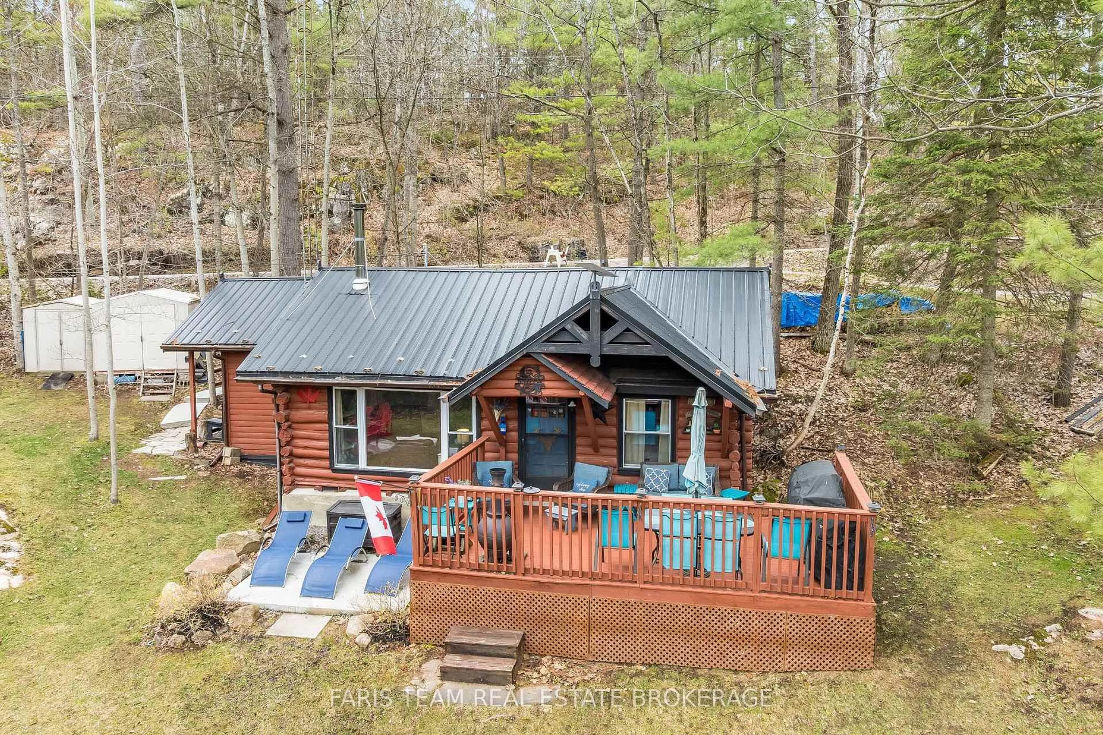 A pic from outside/outdoor area/front of a property/back of a property/a pic from drone, unknown for 42 Black River Rd, Kawartha Lakes Ontario L0K 2B0