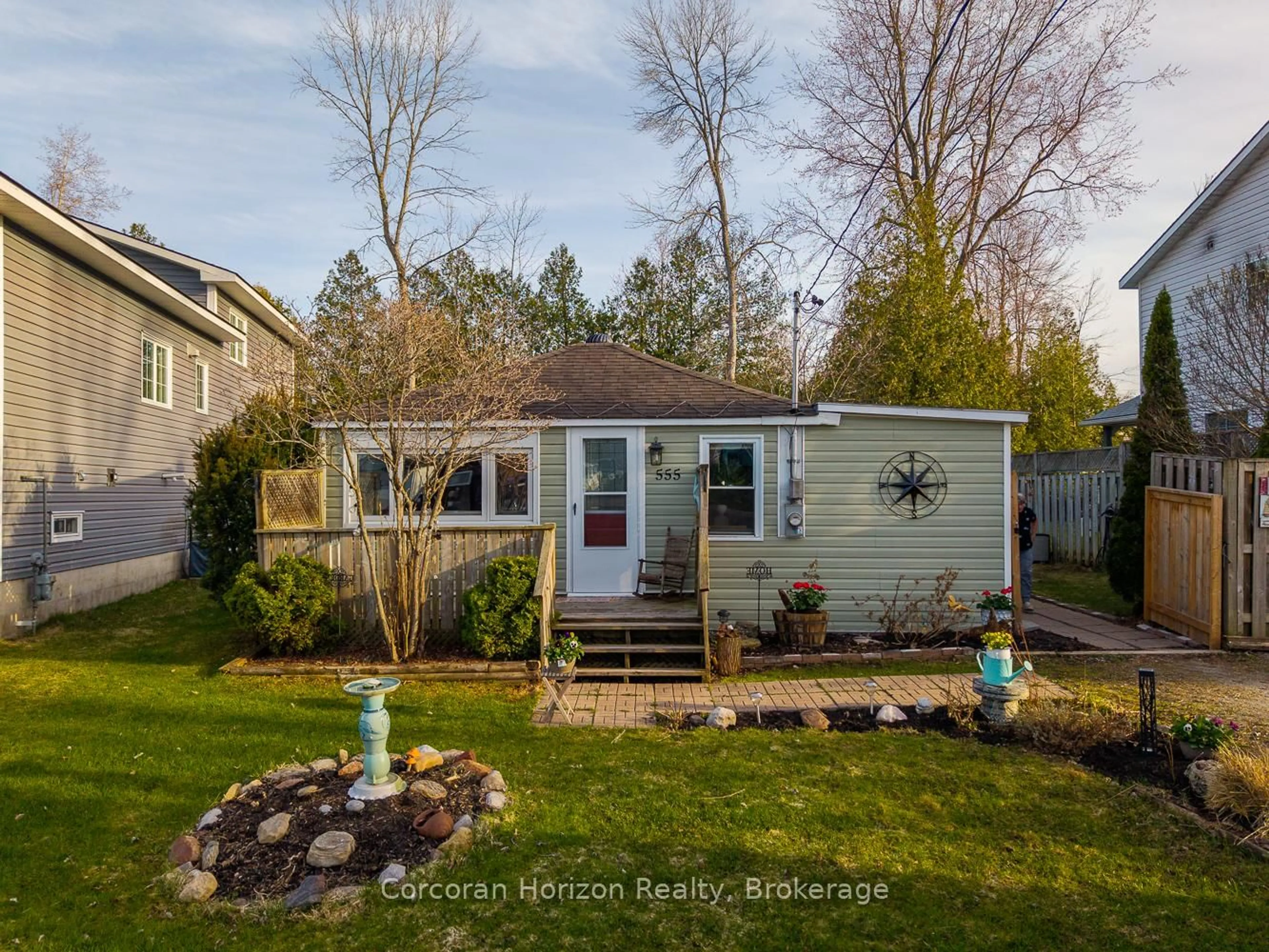 Home with vinyl exterior material, street for 555 O'Leary Lane, Tay Ontario L0K 2A0