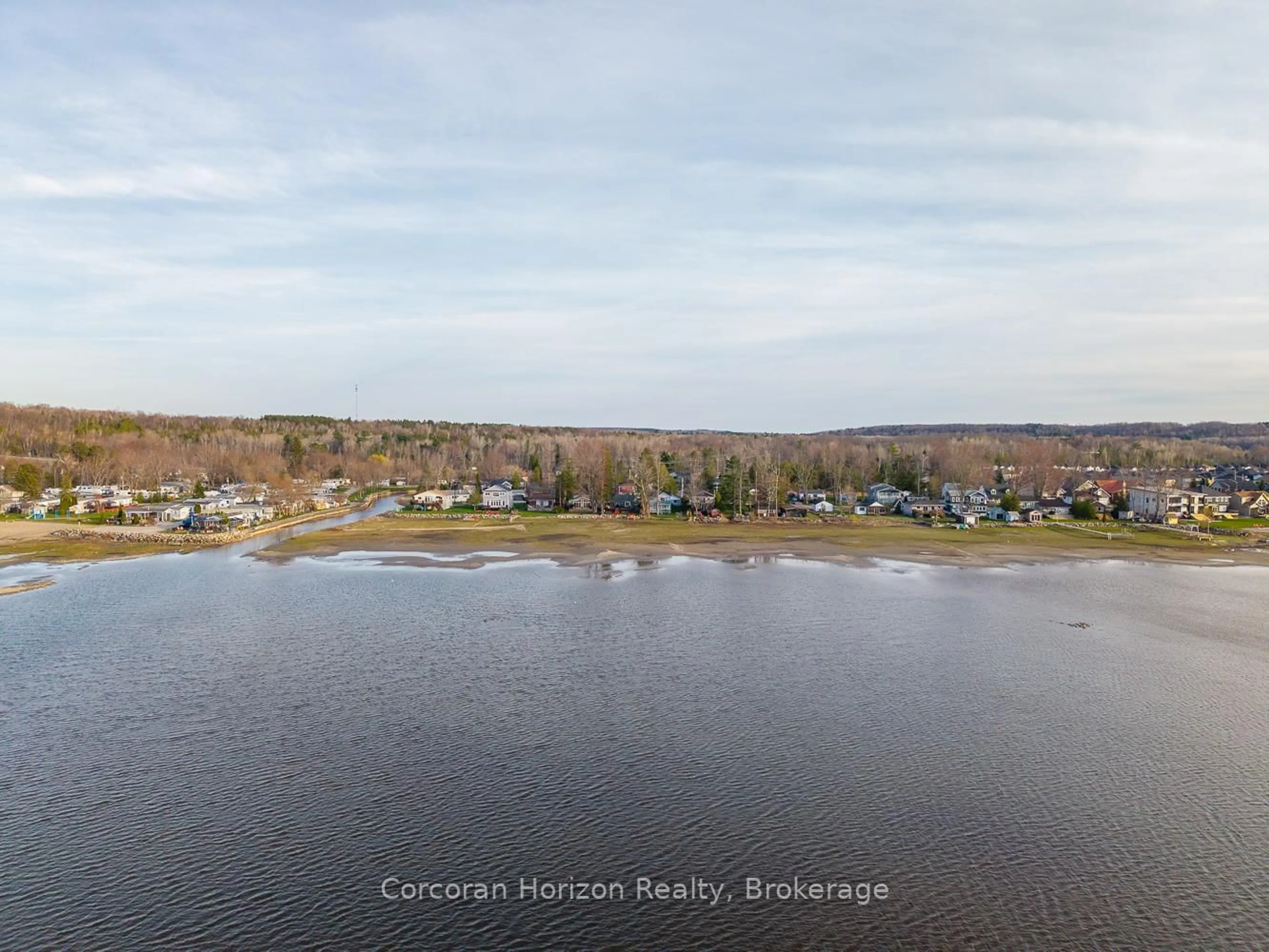 A pic from outside/outdoor area/front of a property/back of a property/a pic from drone, water/lake/river/ocean view for 555 O'Leary Lane, Tay Ontario L0K 2A0