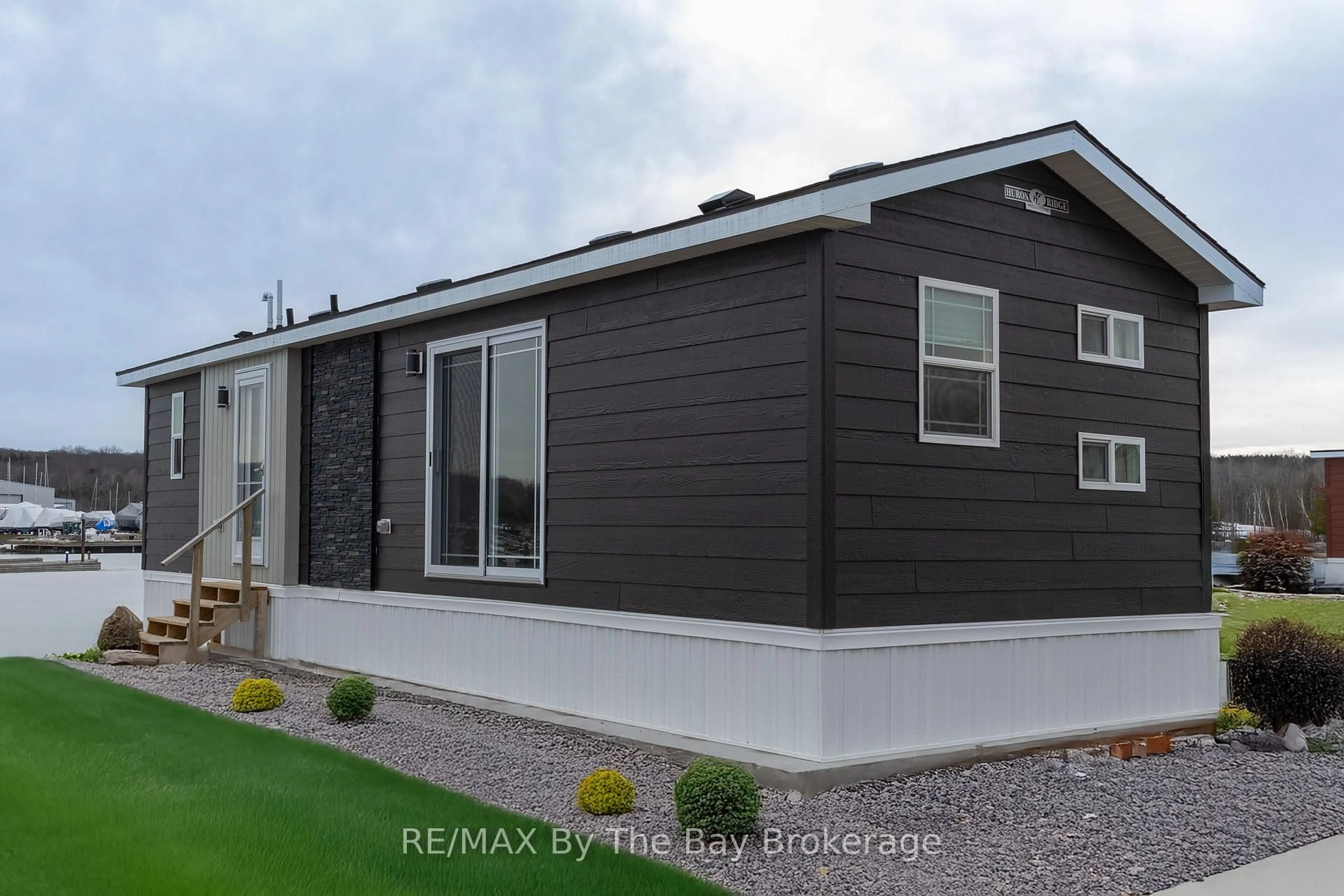 Home with vinyl exterior material, street for 3282 Ogdens Beach Rd #62, Midland Ontario L9S 2K6