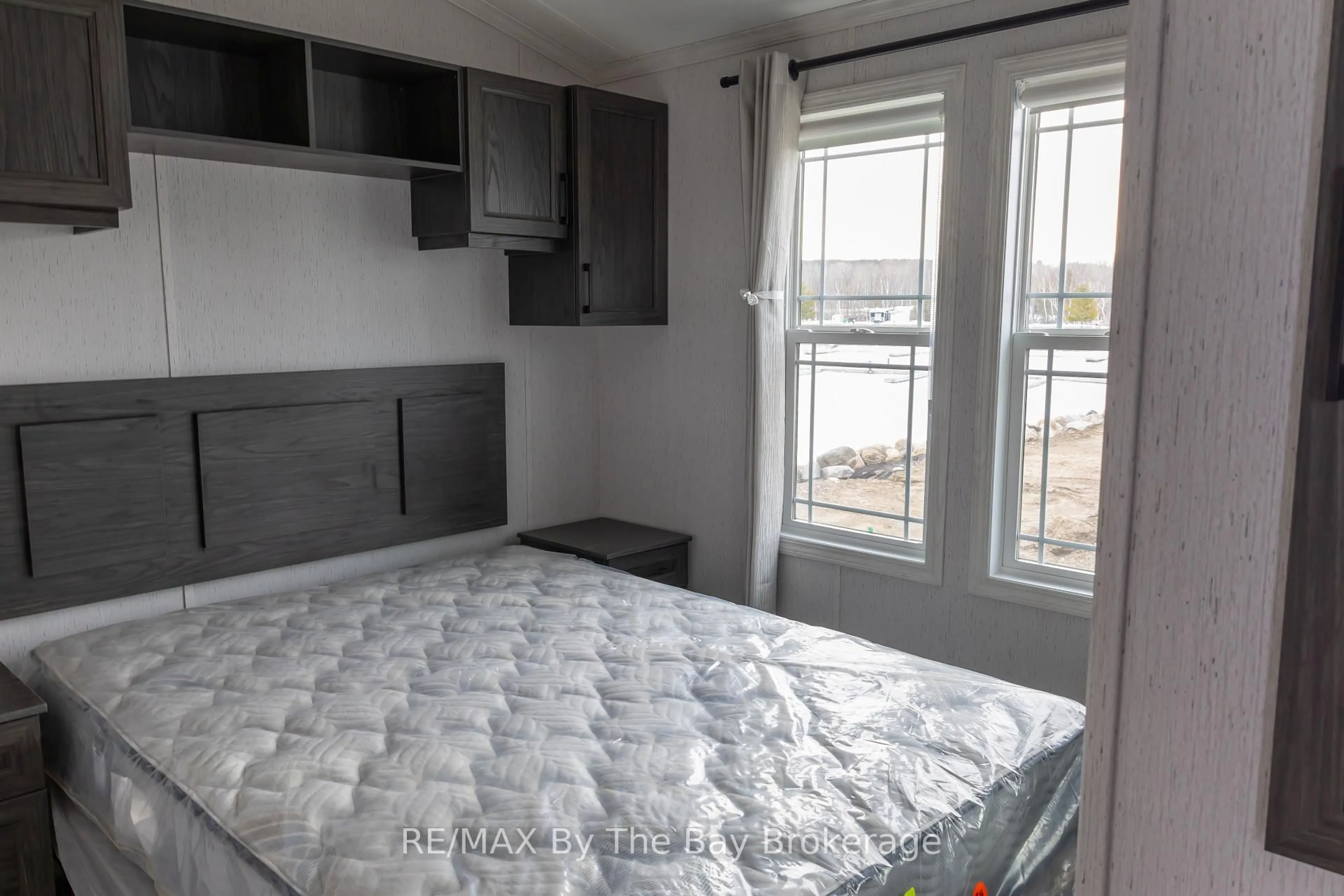 Bedroom with bed, unknown for 3282 Ogdens Beach Rd #62, Midland Ontario L9S 2K6
