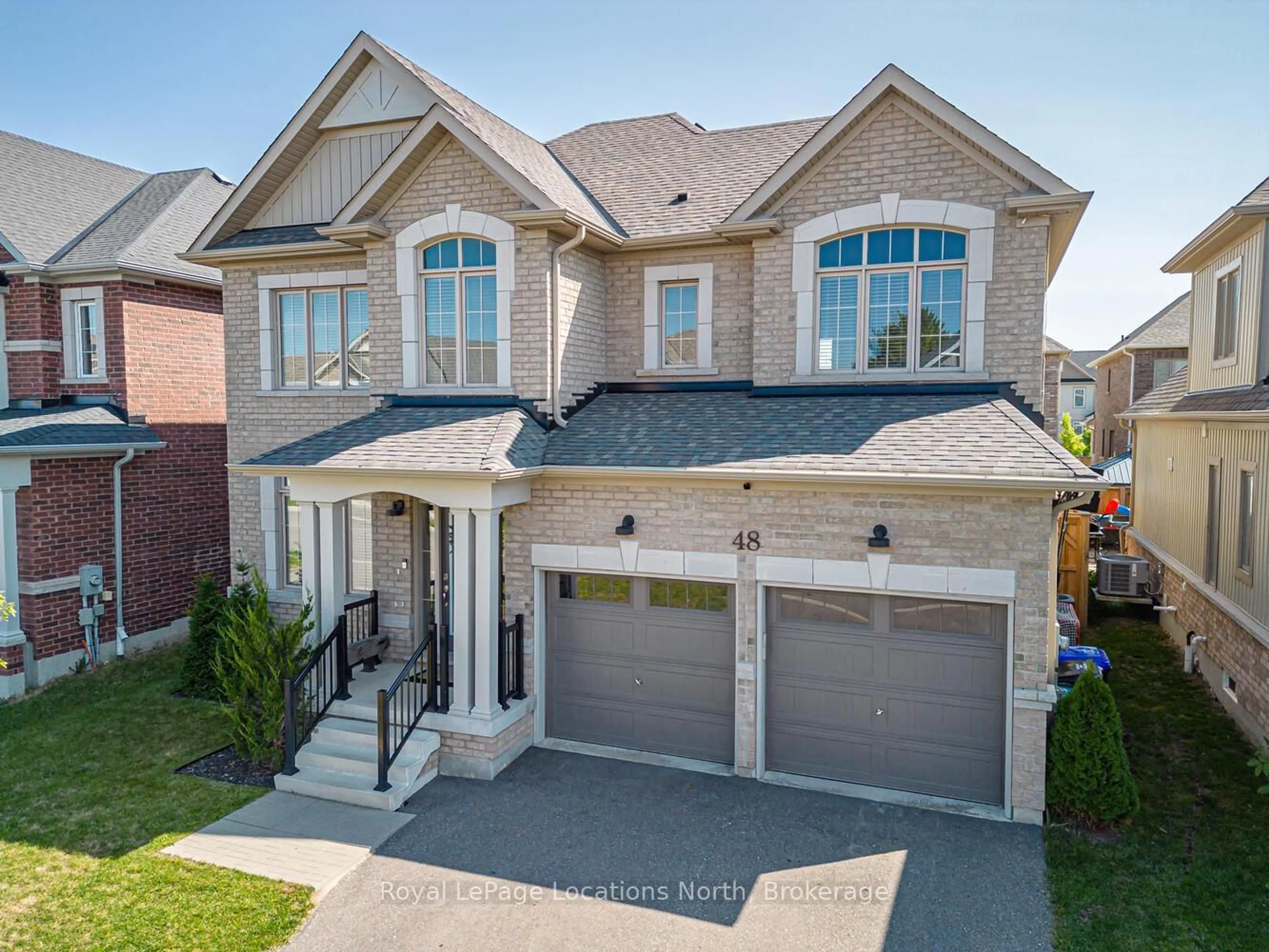 Home with brick exterior material, street for 48 Mclean Ave, Collingwood Ontario L9Y 3Z6