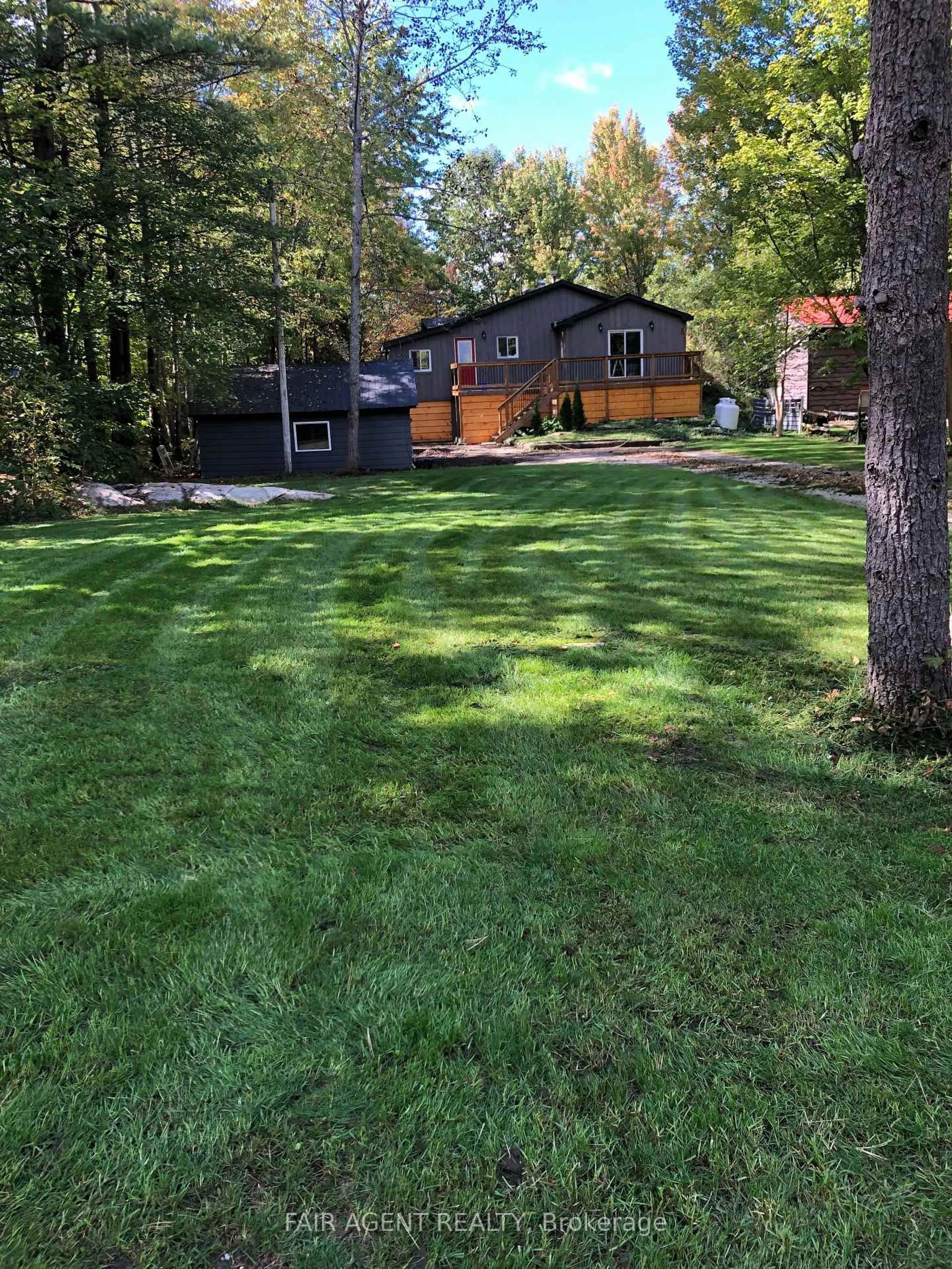 A pic from outside/outdoor area/front of a property/back of a property/a pic from drone, forest/trees view for 7672 DONER Dr, Ramara Ontario L0K 2B0