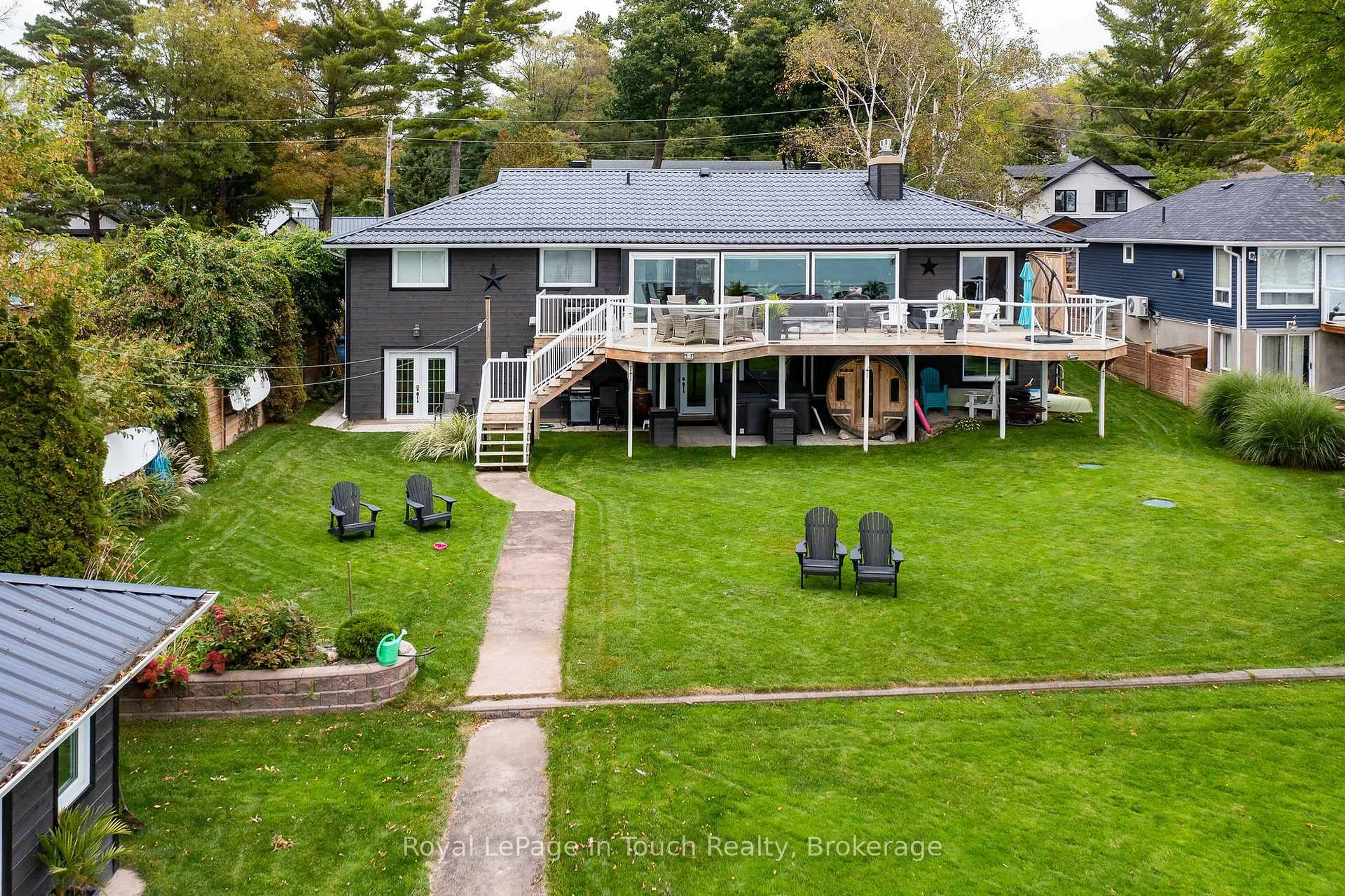 A pic from outside/outdoor area/front of a property/back of a property/a pic from drone, water/lake/river/ocean view for 8 TINY BEACHES Rd, Tiny Ontario L0L 2J0