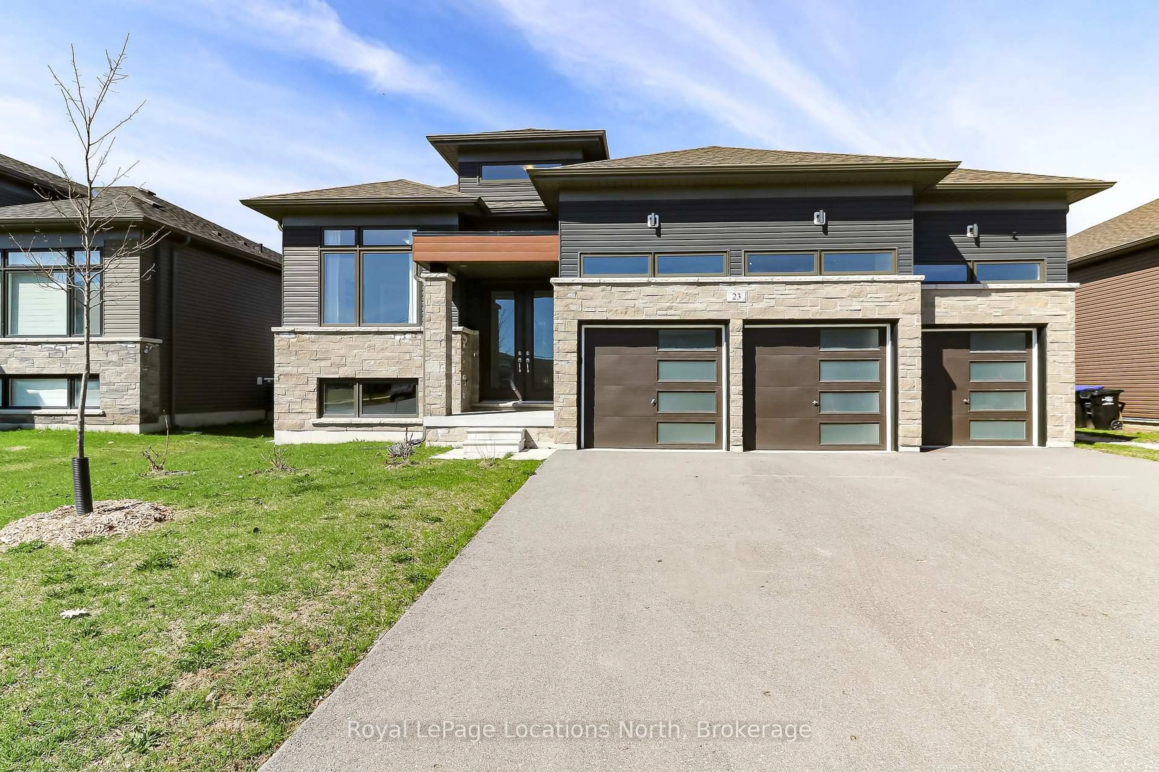 Home with brick exterior material, street for 23 Beatrice Dr, Wasaga Beach Ontario L9Z 0L3