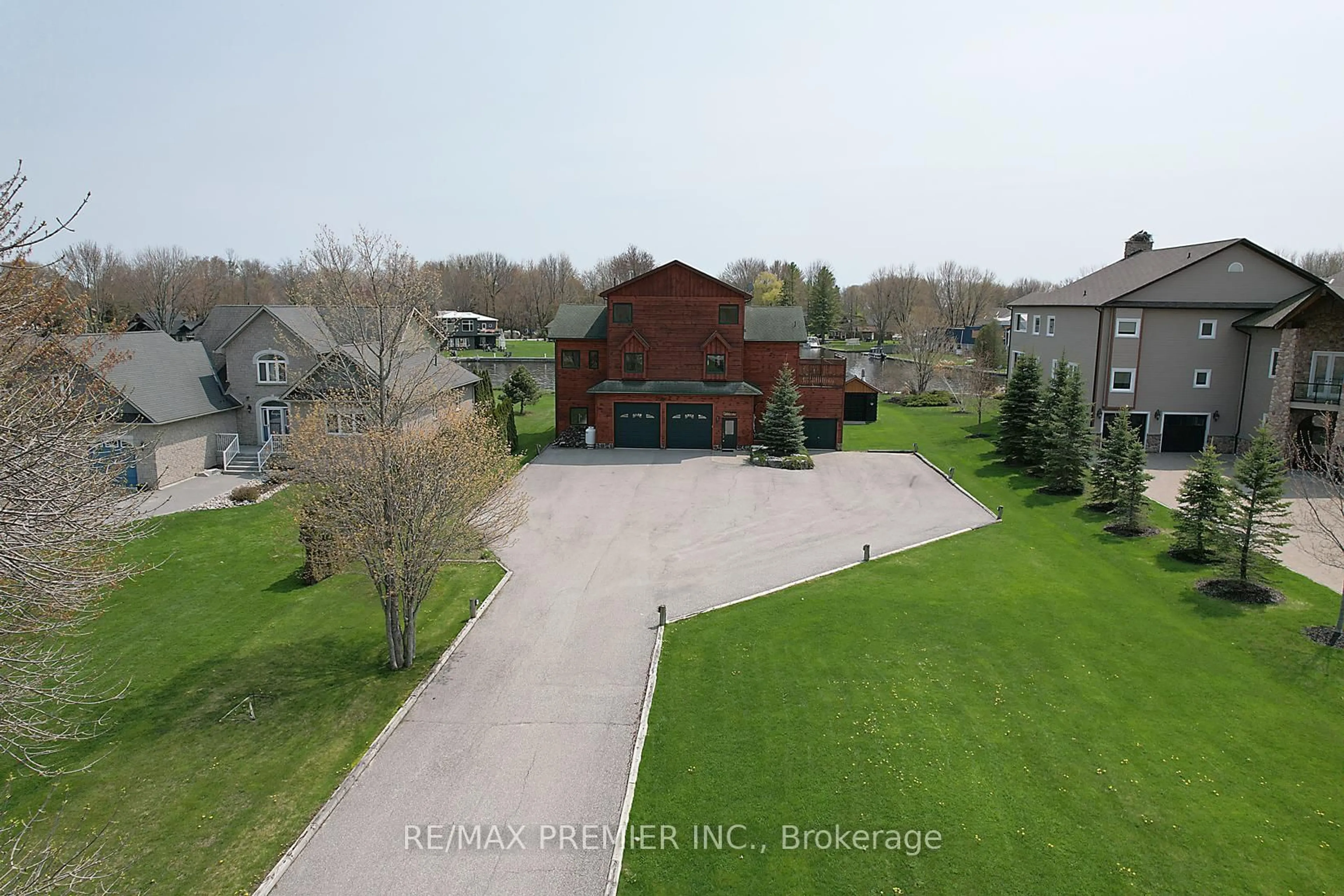 A pic from outside/outdoor area/front of a property/back of a property/a pic from drone, unknown for 31 Paradise Blvd, Ramara Ontario L0K 1B0