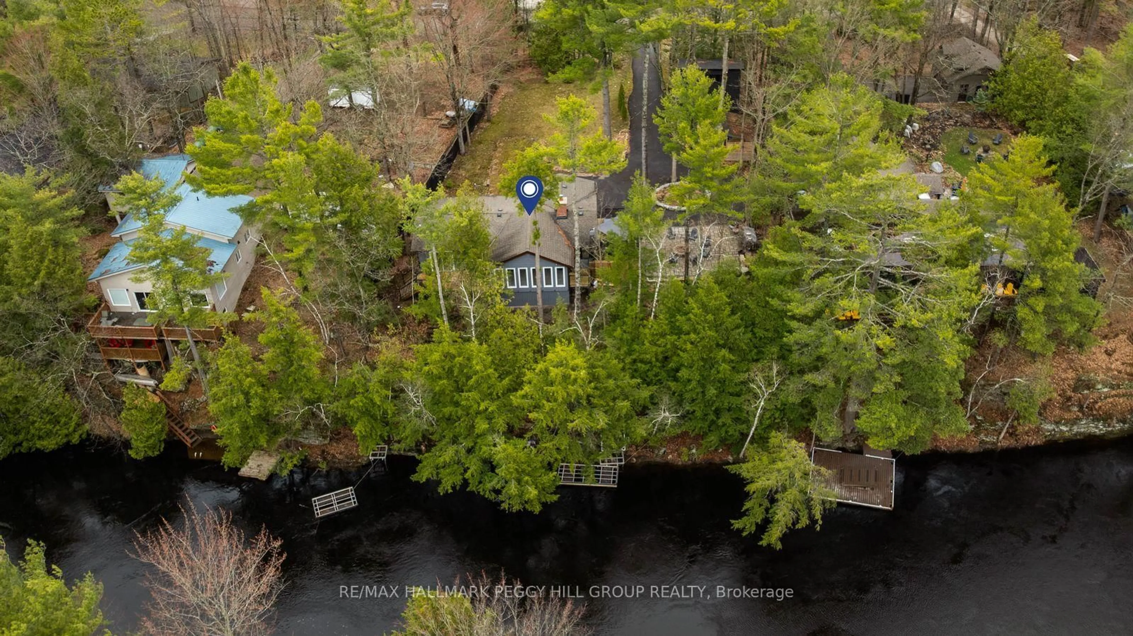 A pic from outside/outdoor area/front of a property/back of a property/a pic from drone, forest/trees view for 7672 Birch Dr, Ramara Ontario L0K 2B0