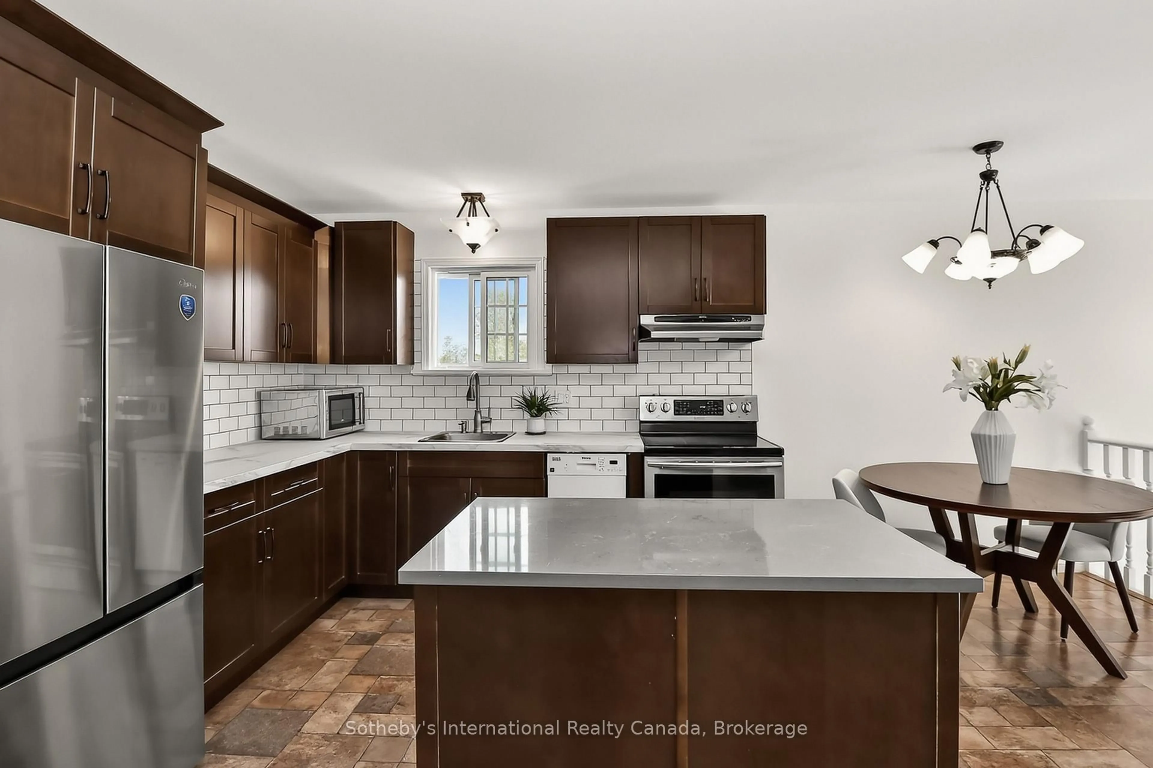 Open concept kitchen, ceramic/tile floor for 224 Beech St, Clearview Ontario L0M 1S0
