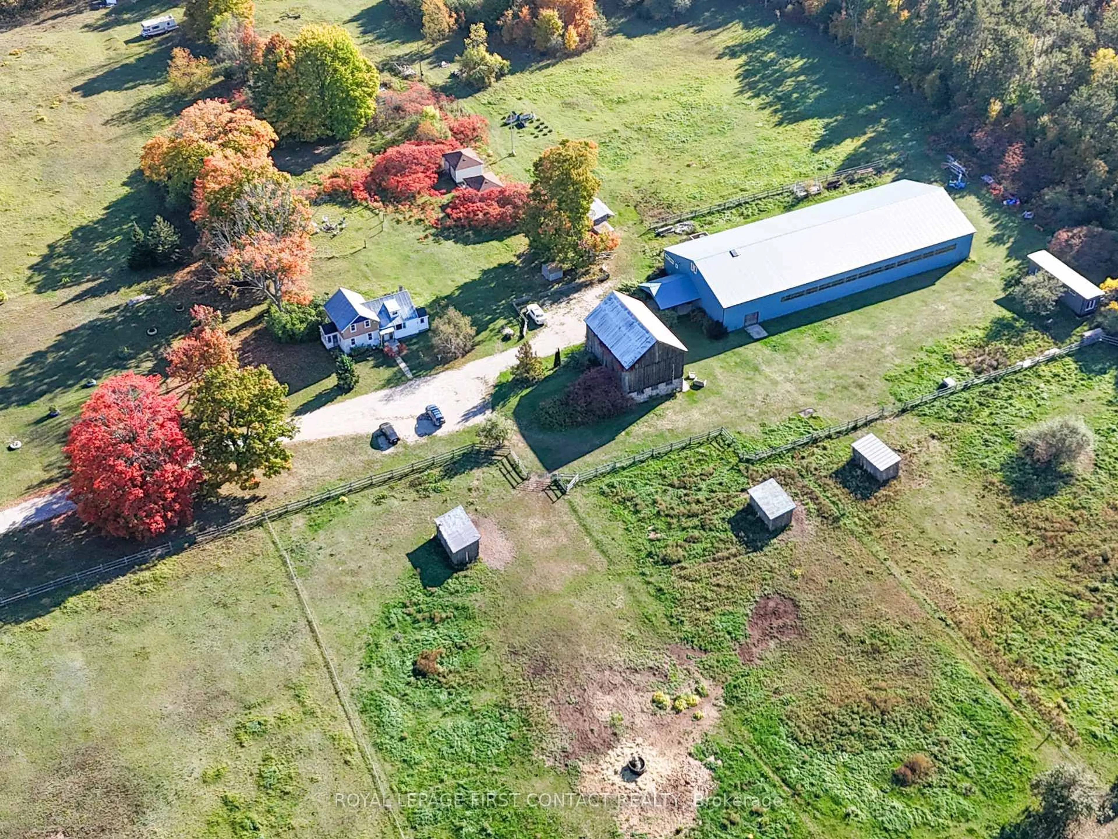 A pic from outside/outdoor area/front of a property/back of a property/a pic from drone, unknown for 2041 Flos 4 Rd, Springwater Ontario L0L 2K0