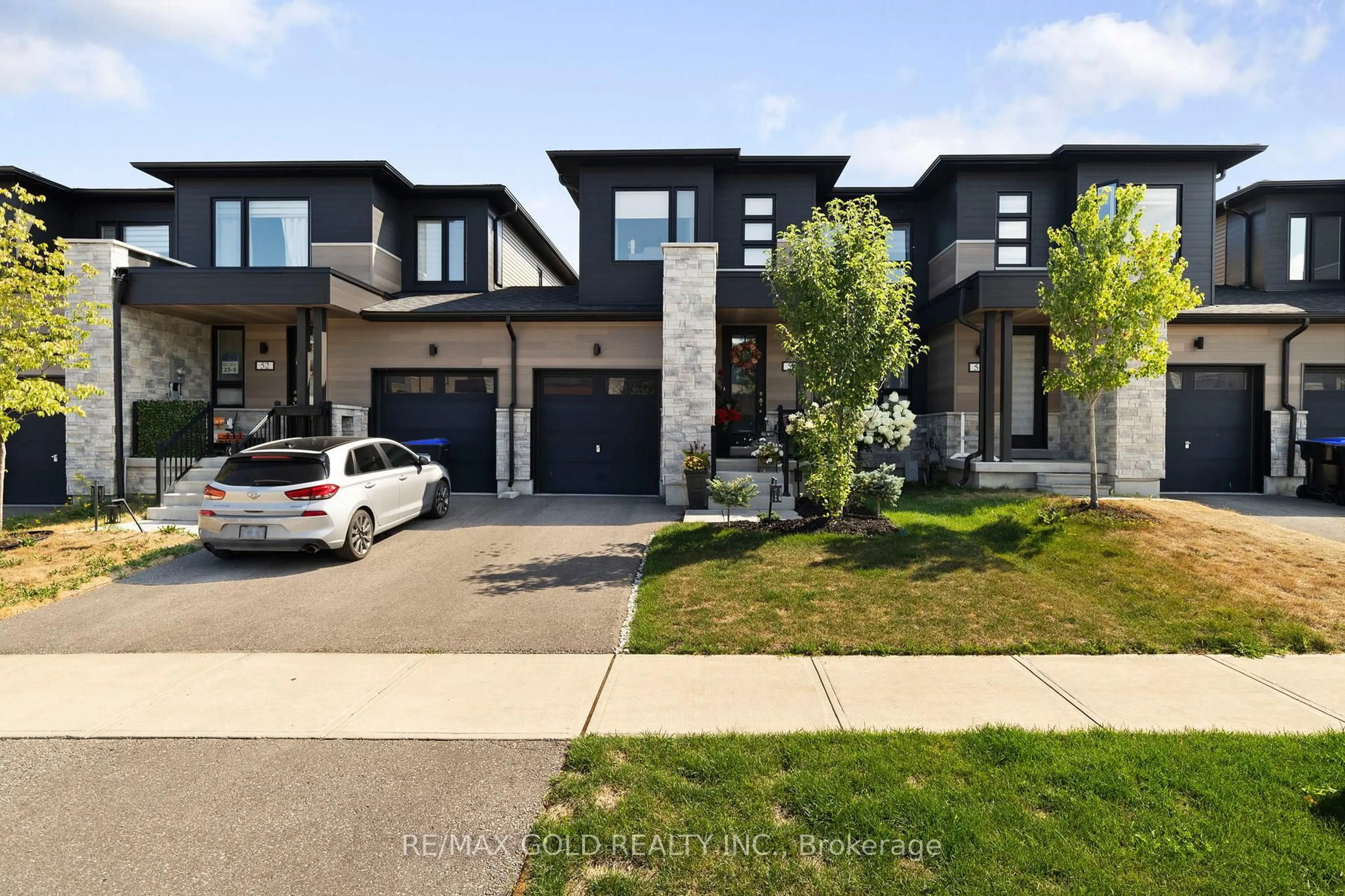 Home with brick exterior material, street for 54 Eberhardt Dr, Wasaga Beach Ontario L9Z 0K5