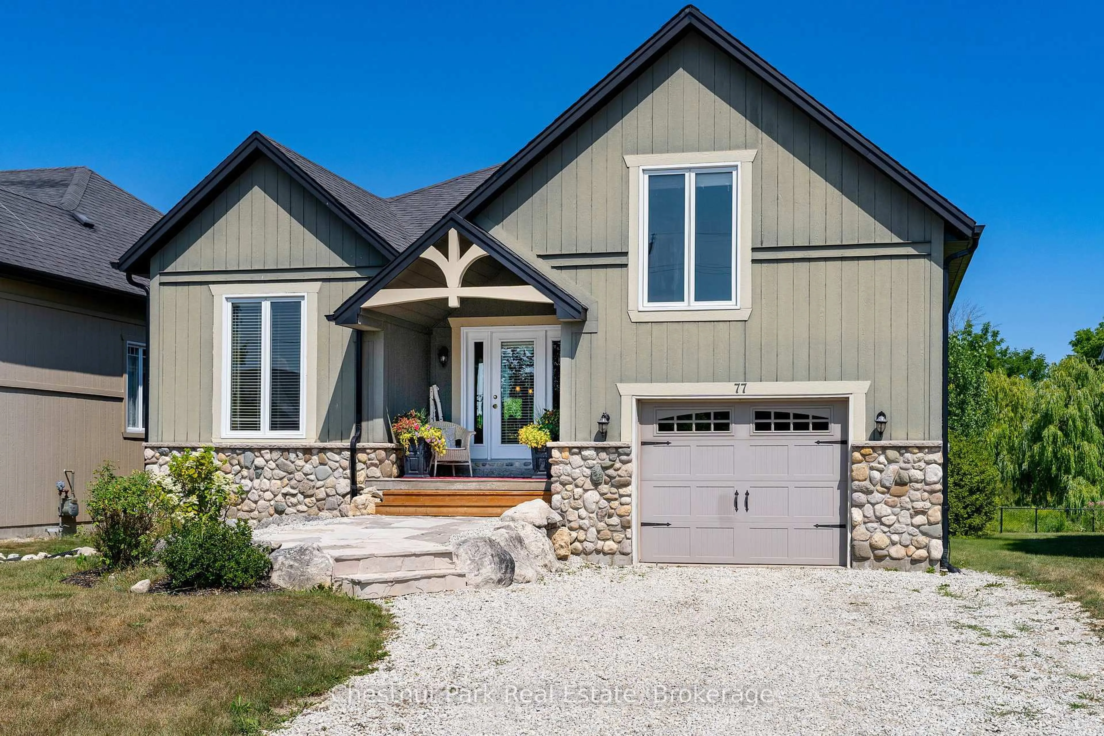 Home with vinyl exterior material, street for 77 Findlay Dr, Collingwood Ontario L9Y 0G6