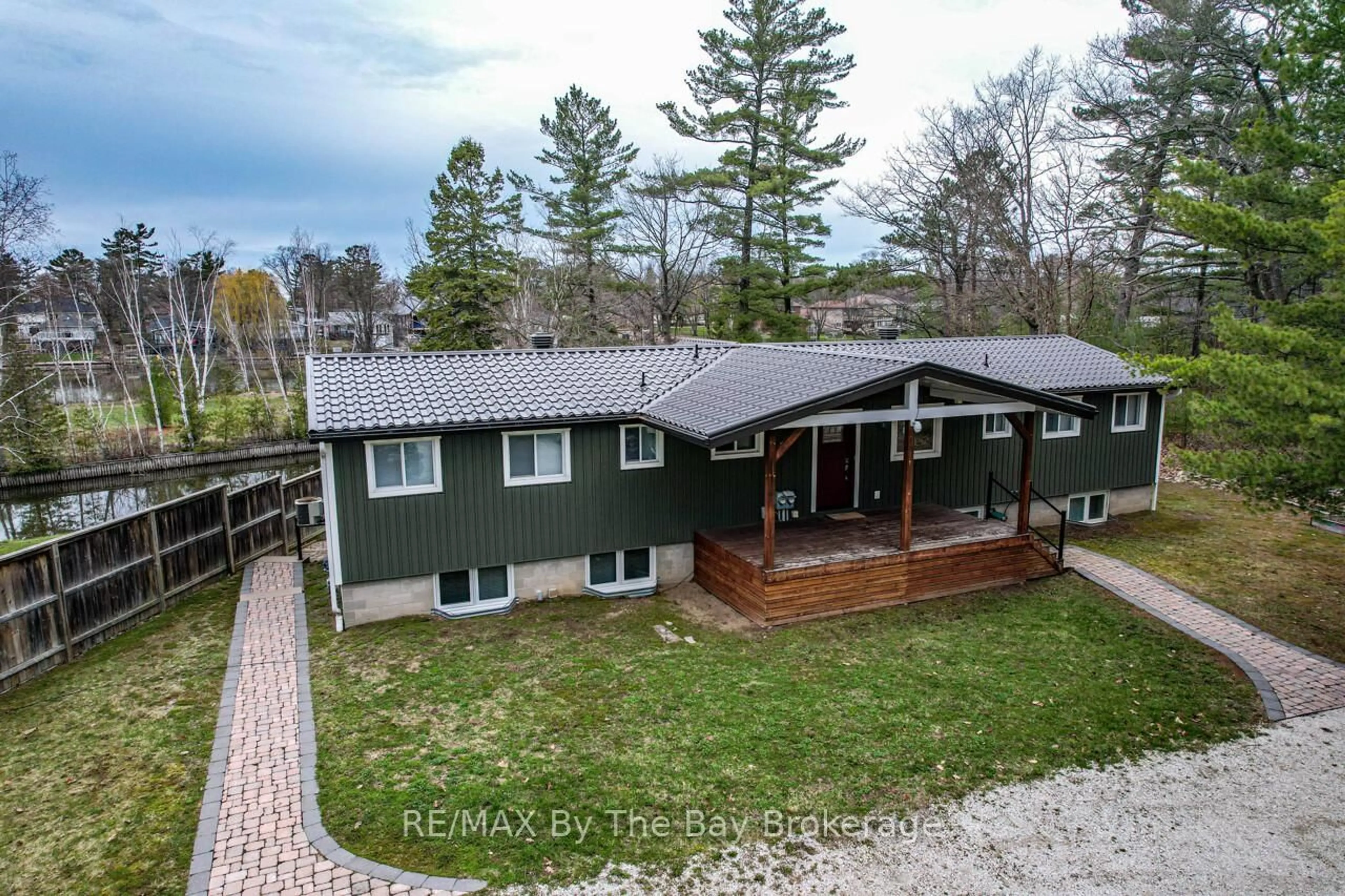 A pic from outside/outdoor area/front of a property/back of a property/a pic from drone, water/lake/river/ocean view for 1628 River Rd, Wasaga Beach Ontario L9Z 2S3