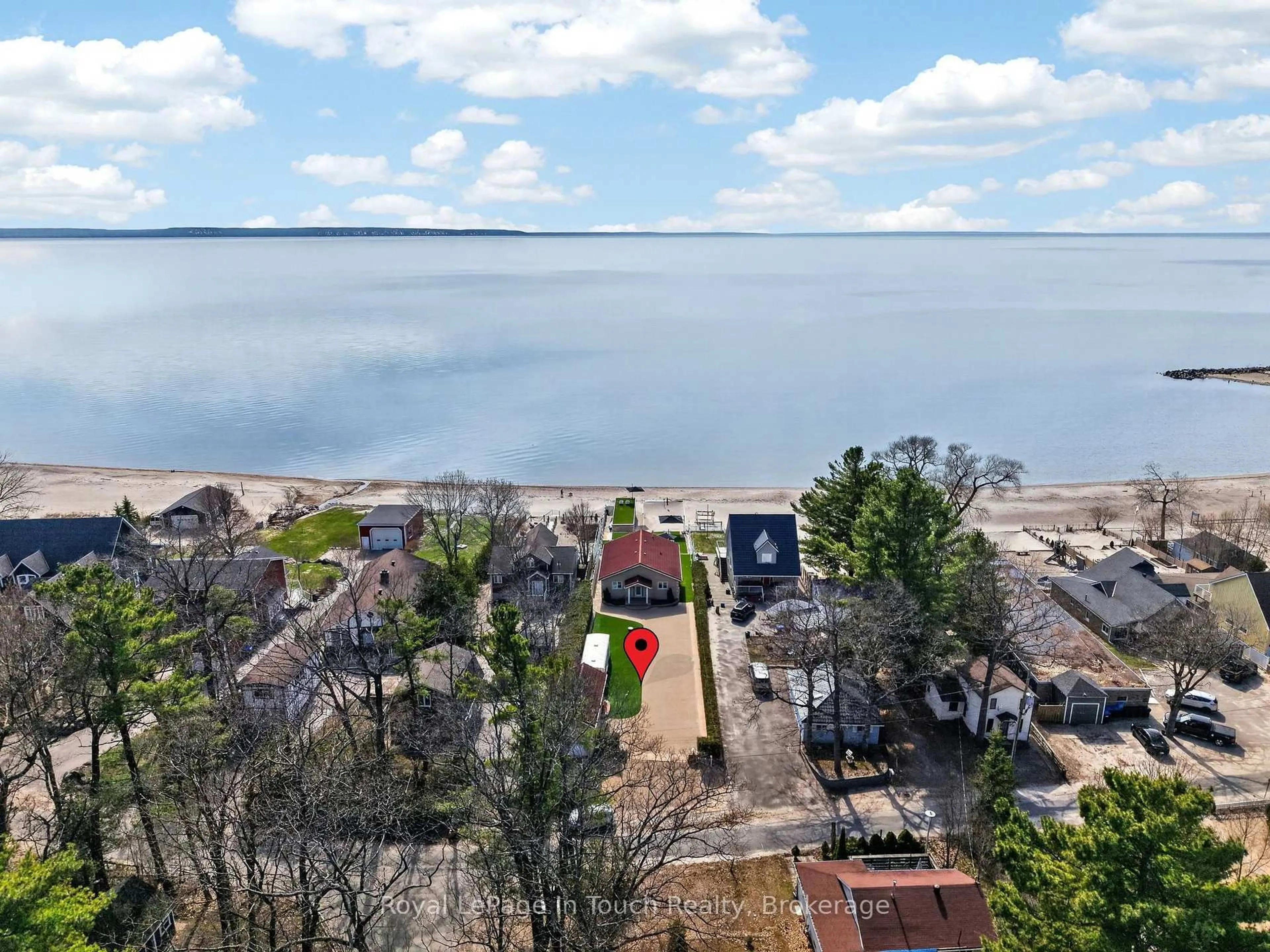 A pic from outside/outdoor area/front of a property/back of a property/a pic from drone, water/lake/river/ocean view for 32 Tiny Beaches Rd, Tiny Ontario L0L 2J0