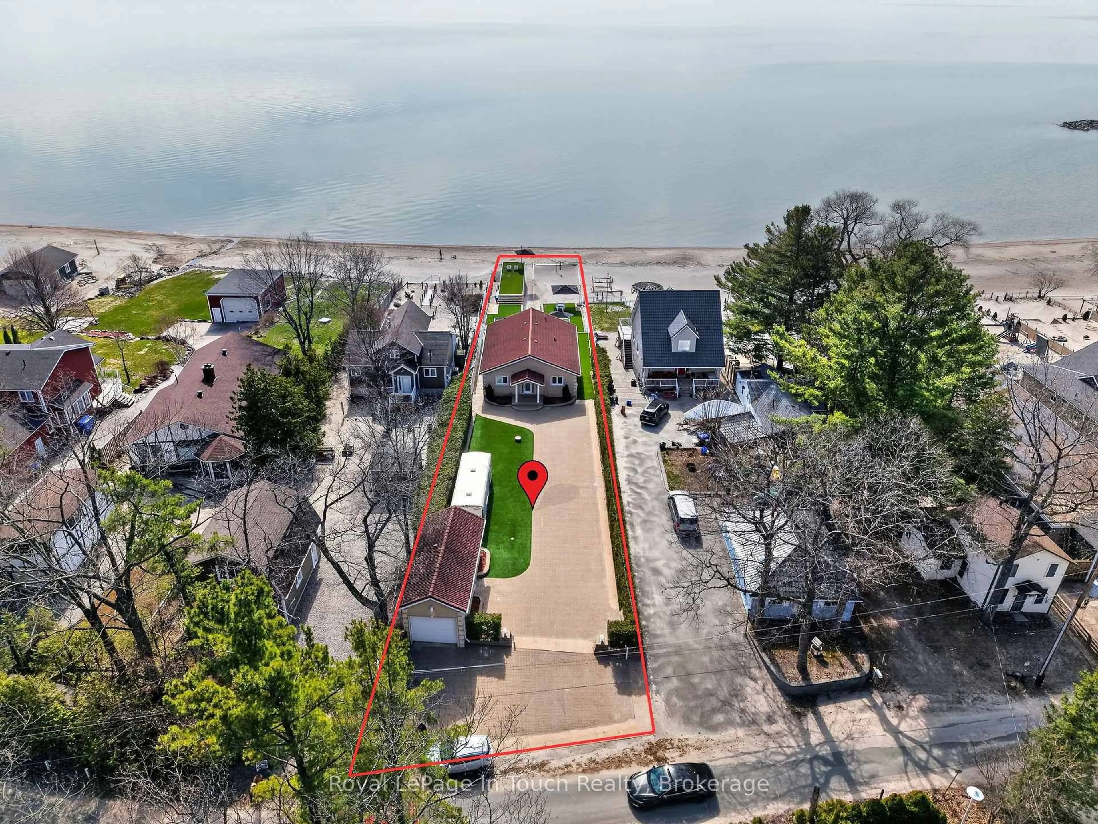 A pic from outside/outdoor area/front of a property/back of a property/a pic from drone, water/lake/river/ocean view for 32 Tiny Beaches Rd, Tiny Ontario L0L 2J0