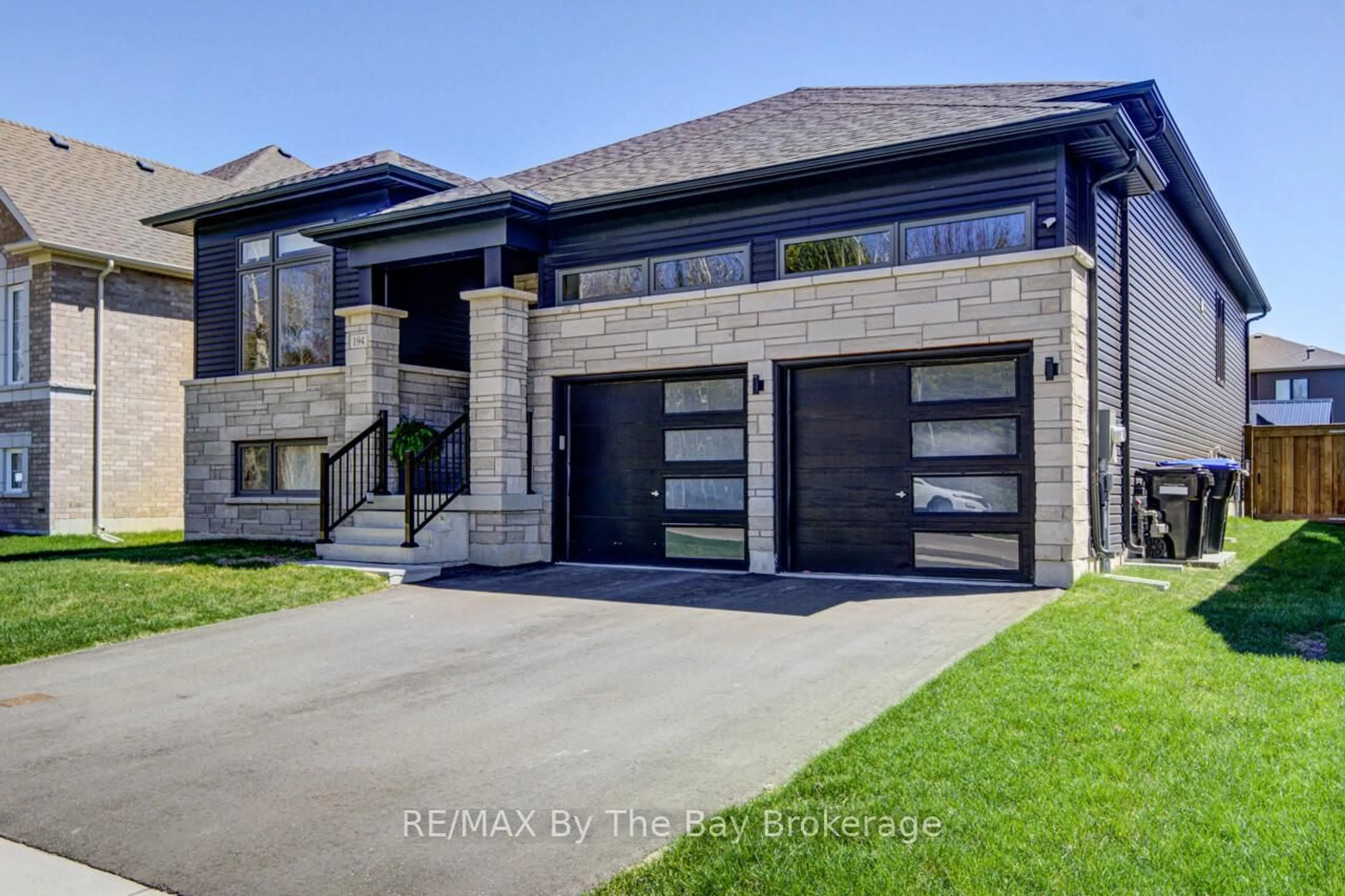 Home with brick exterior material, street for 194 Mapleside Dr, Wasaga Beach Ontario L9Z 0L4