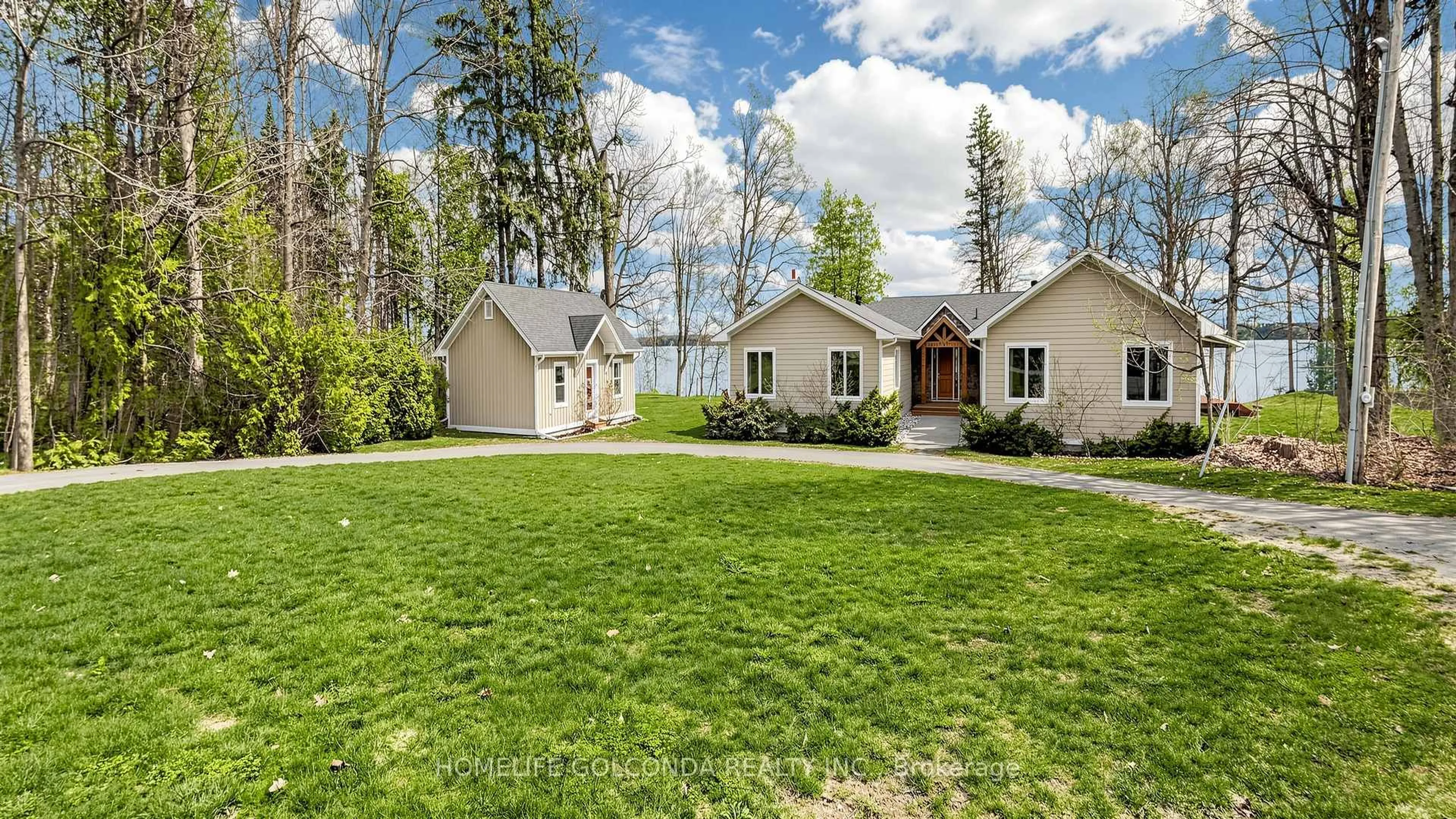 A pic from outside/outdoor area/front of a property/back of a property/a pic from drone, street for 1811 Ridge Rd, Oro-Medonte Ontario L9S 3T7