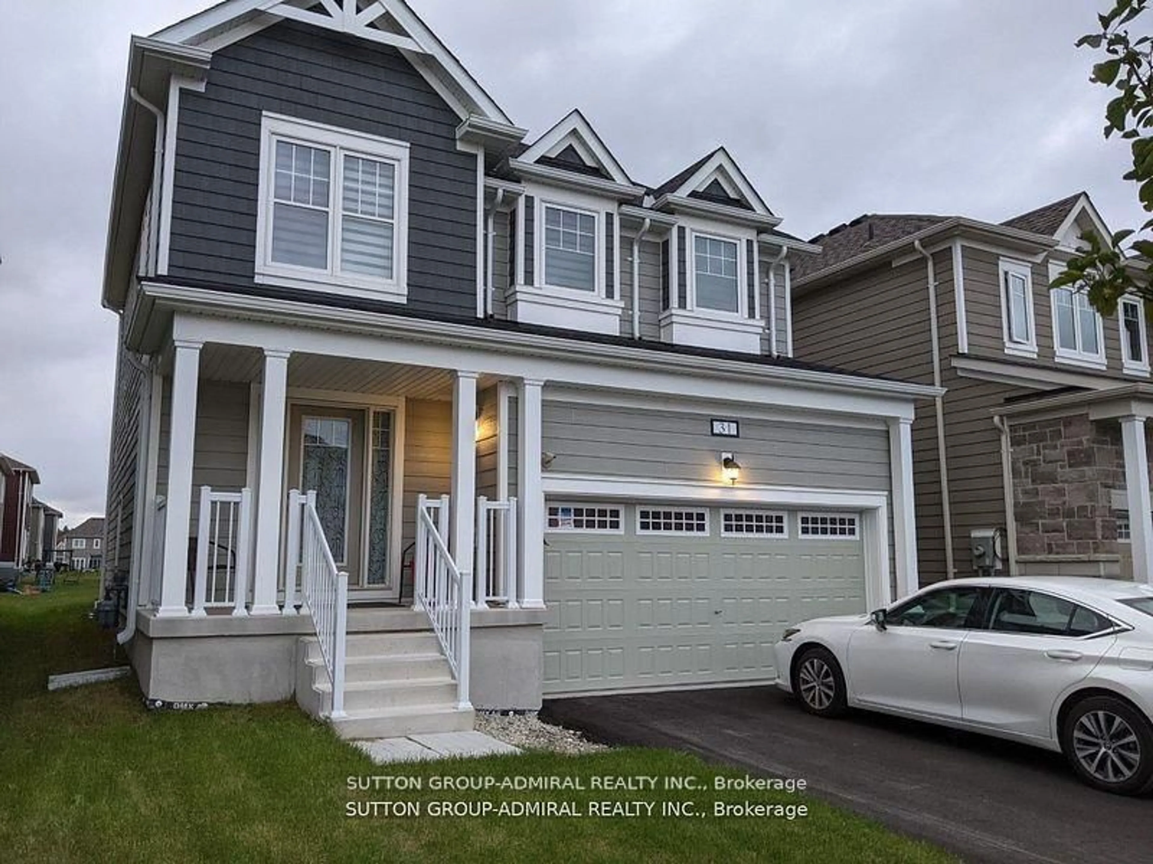 Home with vinyl exterior material, street for 31 Sandhill Crane Dr, Wasaga Beach Ontario L9Z 0J2