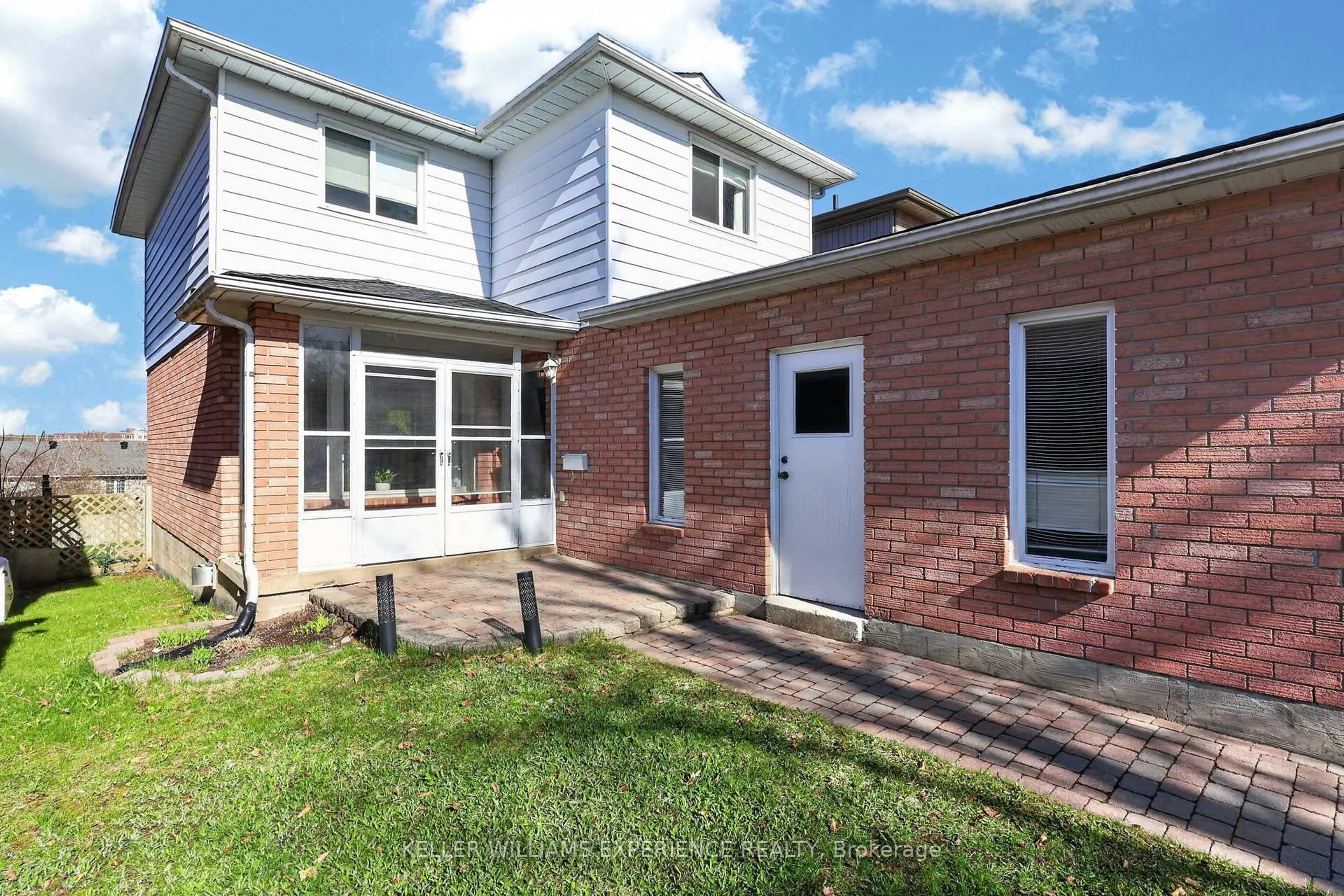 Home with brick exterior material, street for 65 Garden Dr, Barrie Ontario L4N 5T8