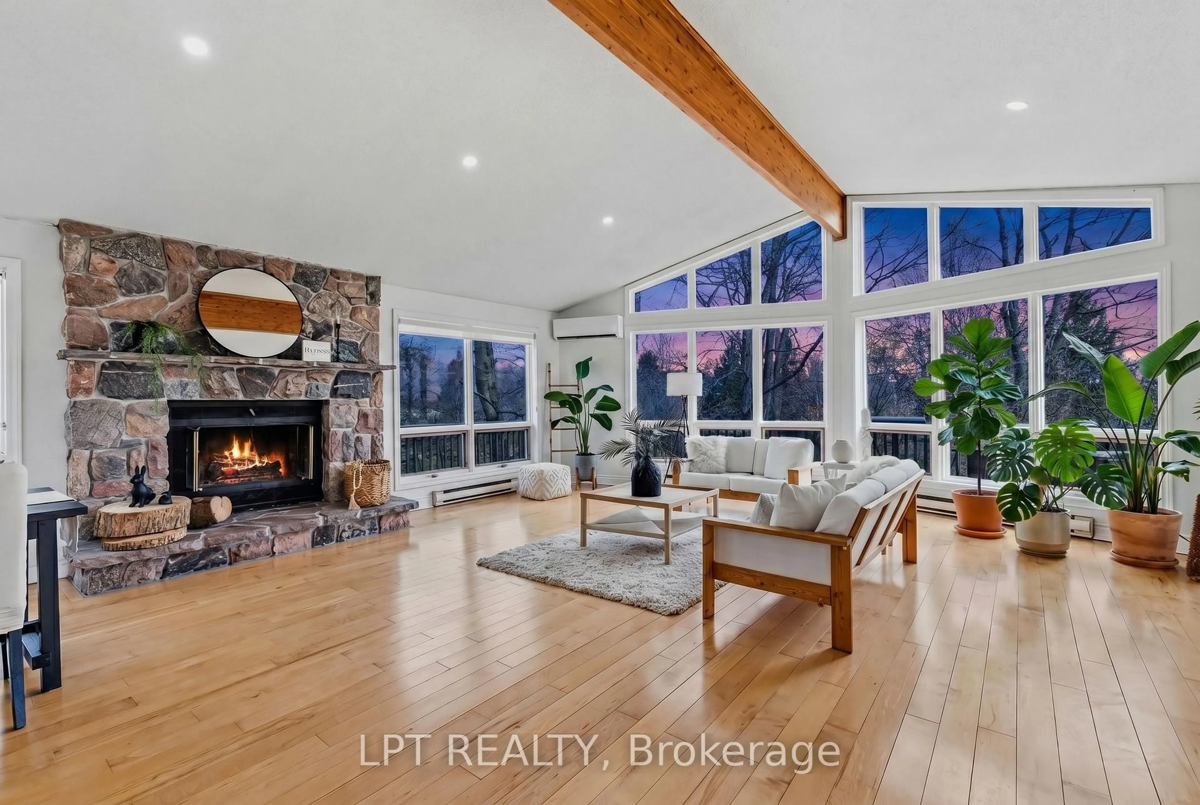 Living room with furniture, wood/laminate floor for 50 Concession Rd 2, Tiny Ontario L0L 2T0
