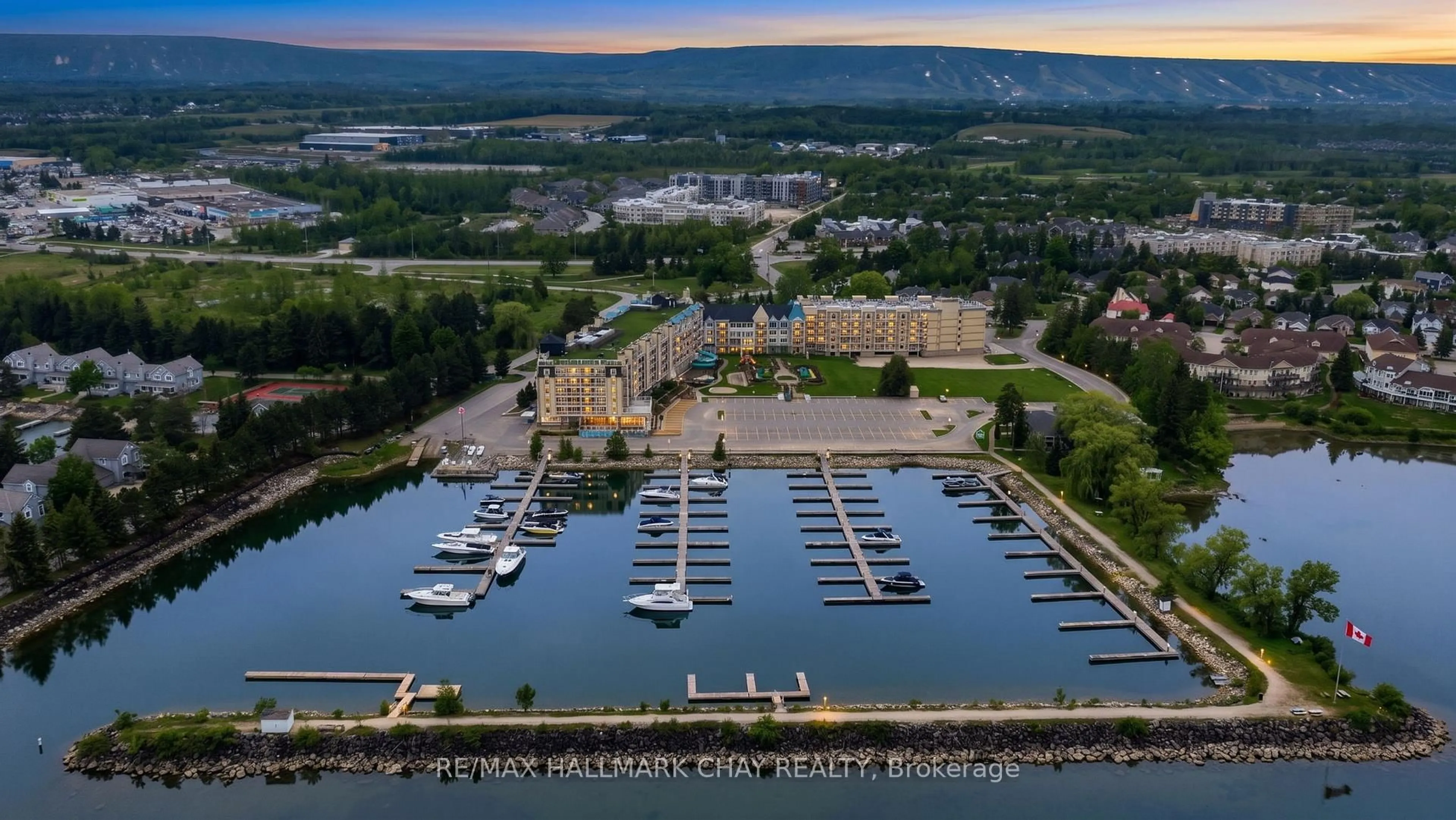 A pic from outside/outdoor area/front of a property/back of a property/a pic from drone, water/lake/river/ocean view for 9 Harbour St #6411/6413, Collingwood Ontario L9Y 5C5