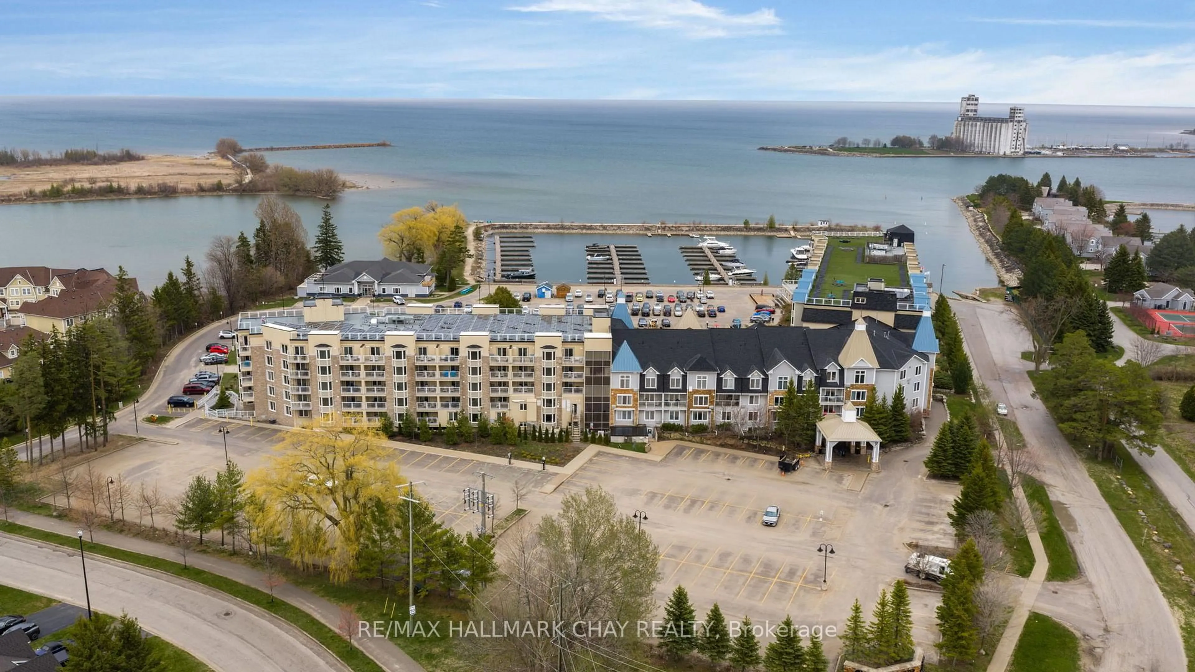 A pic from outside/outdoor area/front of a property/back of a property/a pic from drone, water/lake/river/ocean view for 9 Harbour St #6411/6413, Collingwood Ontario L9Y 5C5
