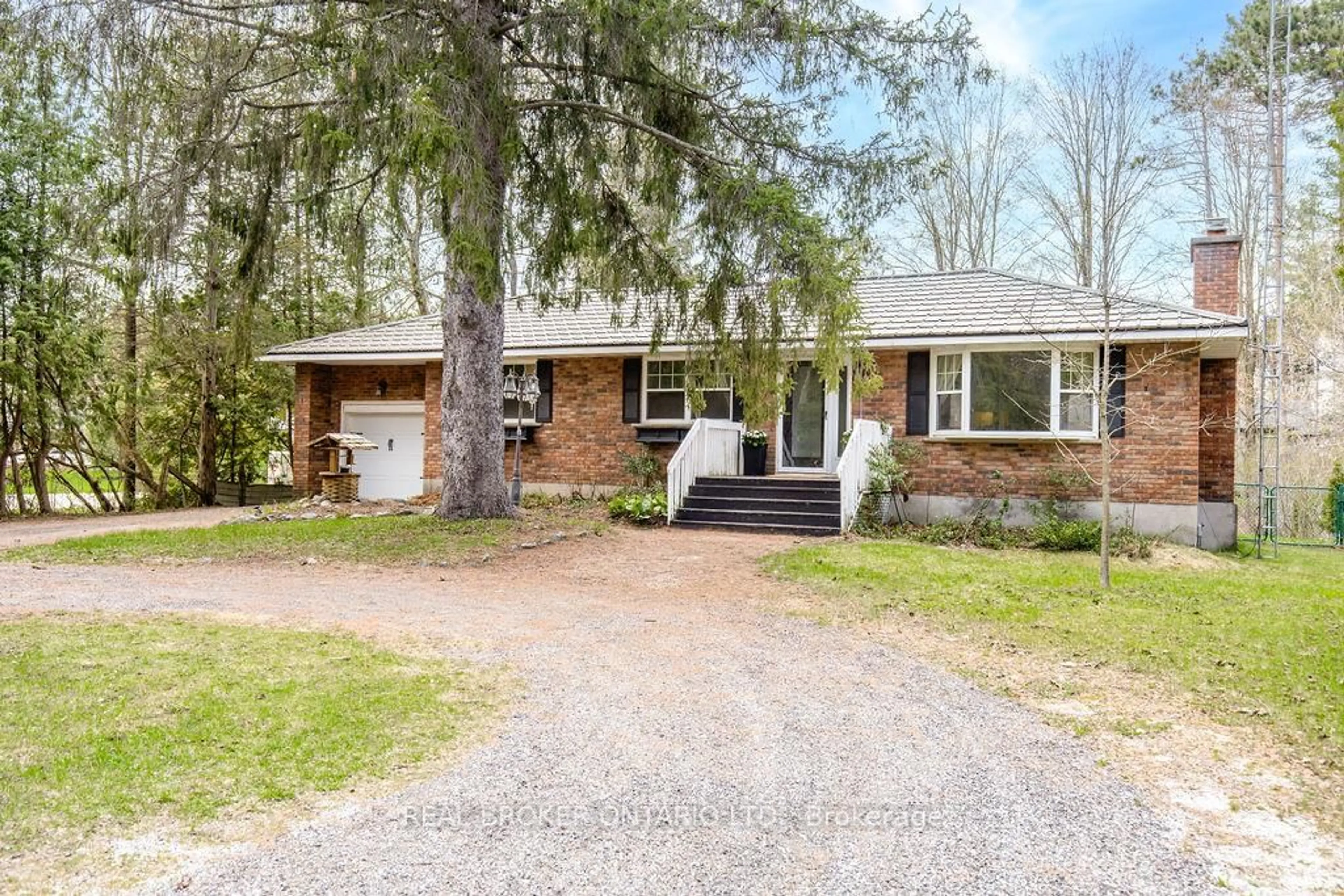 Home with brick exterior material, street for 12 Alexander St, Springwater Ontario L9X 0W1