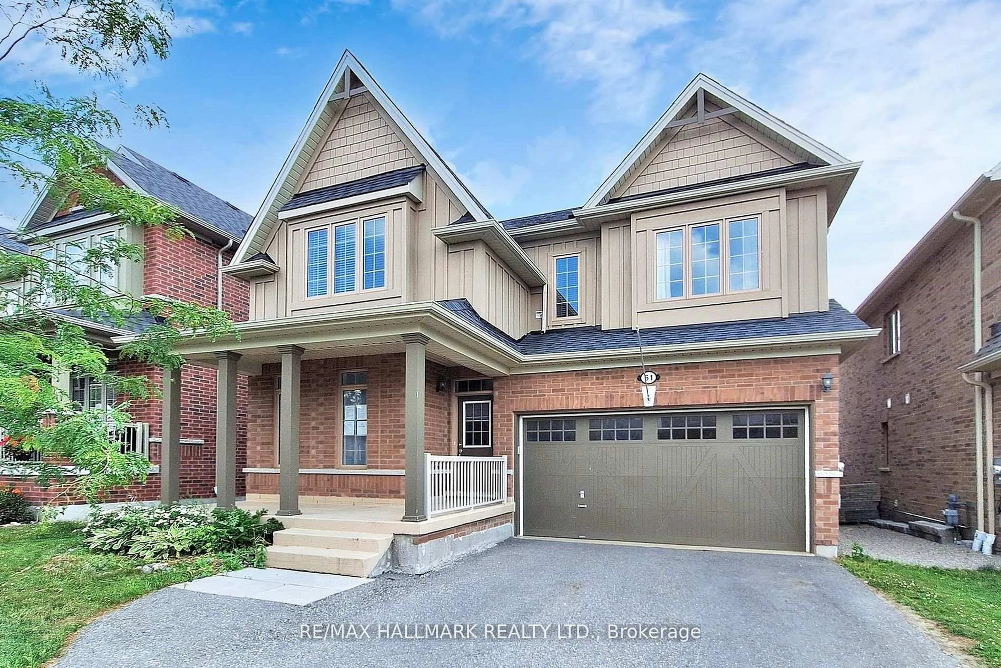 Home with brick exterior material, street for 61 McIsaac Dr, Springwater Ontario L4M 4S4