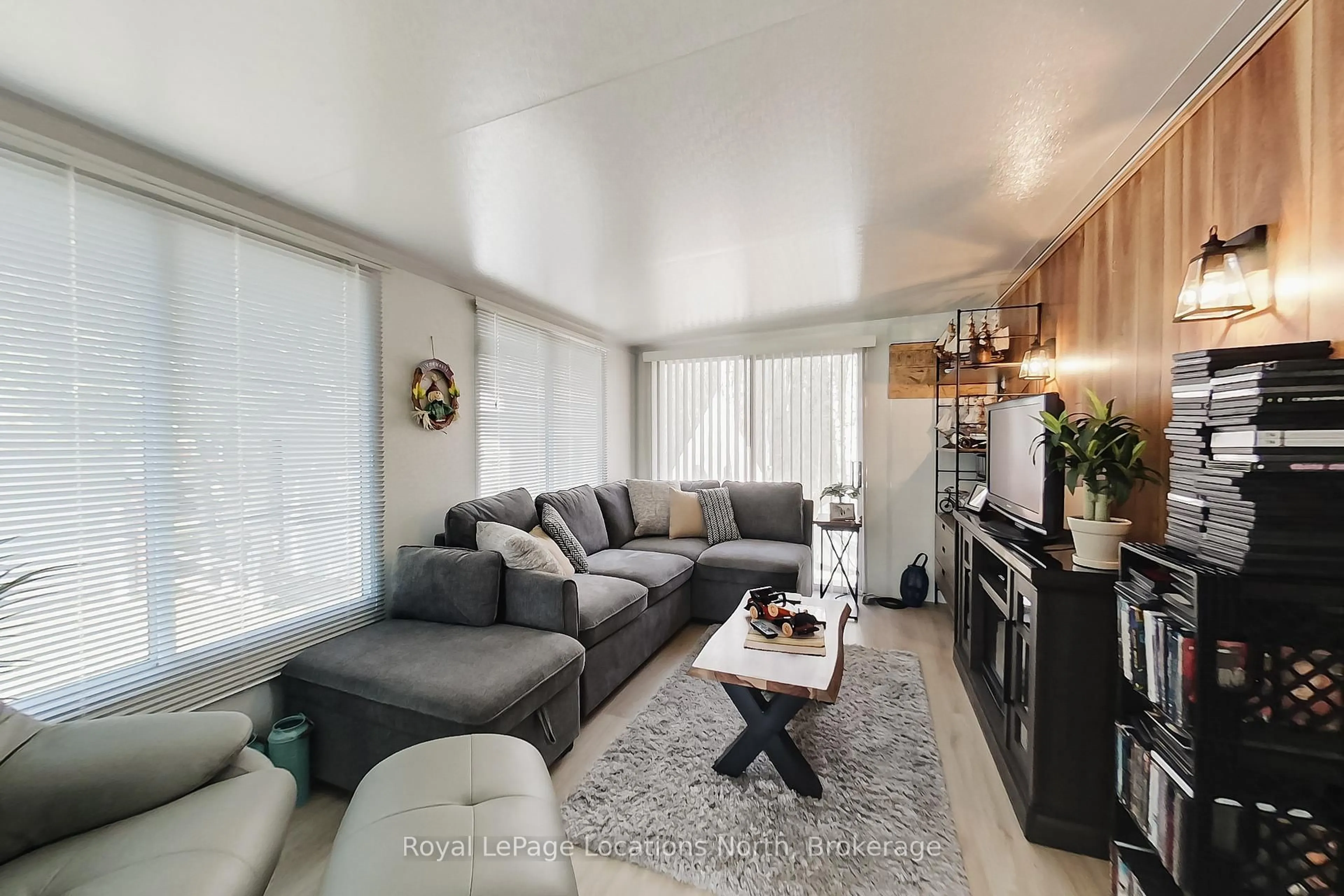 Living room with furniture, unknown for 2 Wasaga Pines Lane, Springwater Ontario L0L 1P0