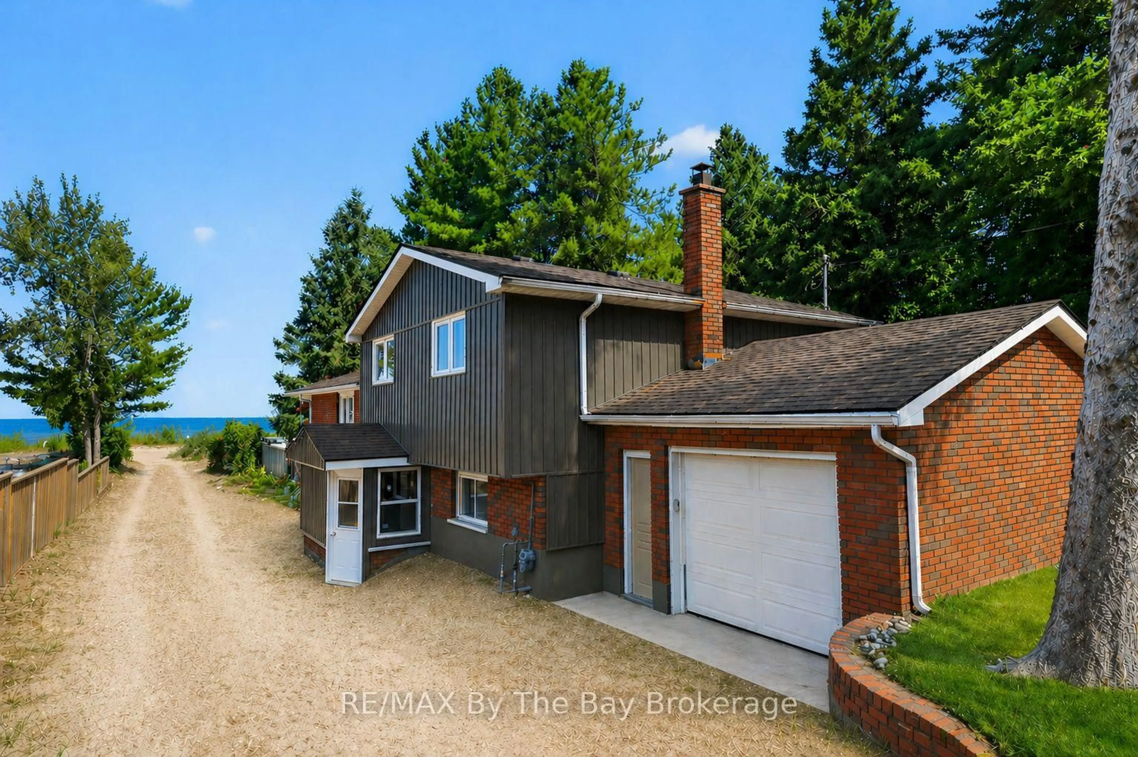 A pic from outside/outdoor area/front of a property/back of a property/a pic from drone, water/lake/river/ocean view for 342 Coastline Dr, Wasaga Beach Ontario L9Z 2M4