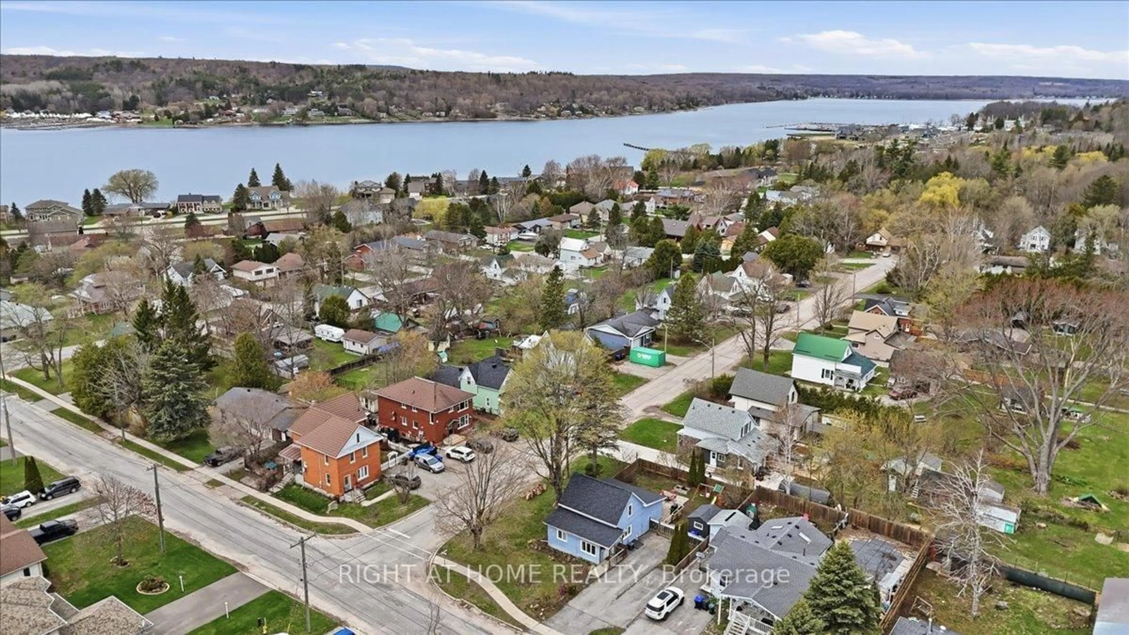 A pic from outside/outdoor area/front of a property/back of a property/a pic from drone, water/lake/river/ocean view for 1 Leonard Ave, Penetanguishene Ontario L9M 1C8