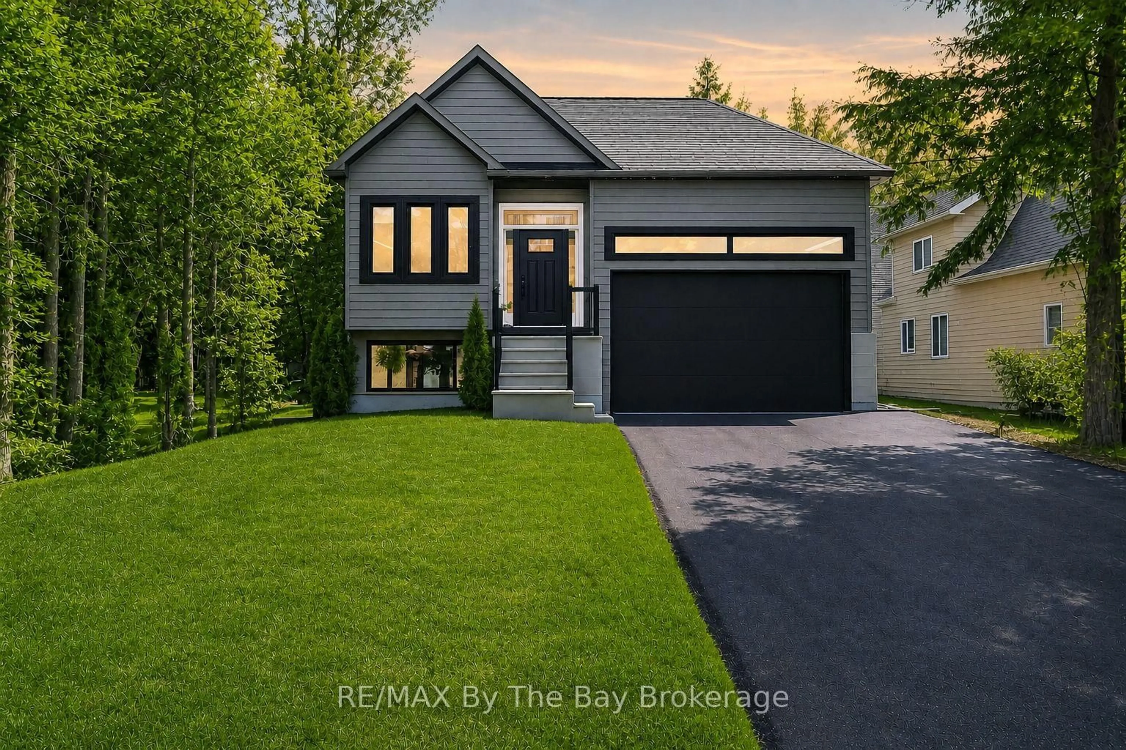 Home with brick exterior material, street for 35 48TH St, Wasaga Beach Ontario L9Z 1Y3
