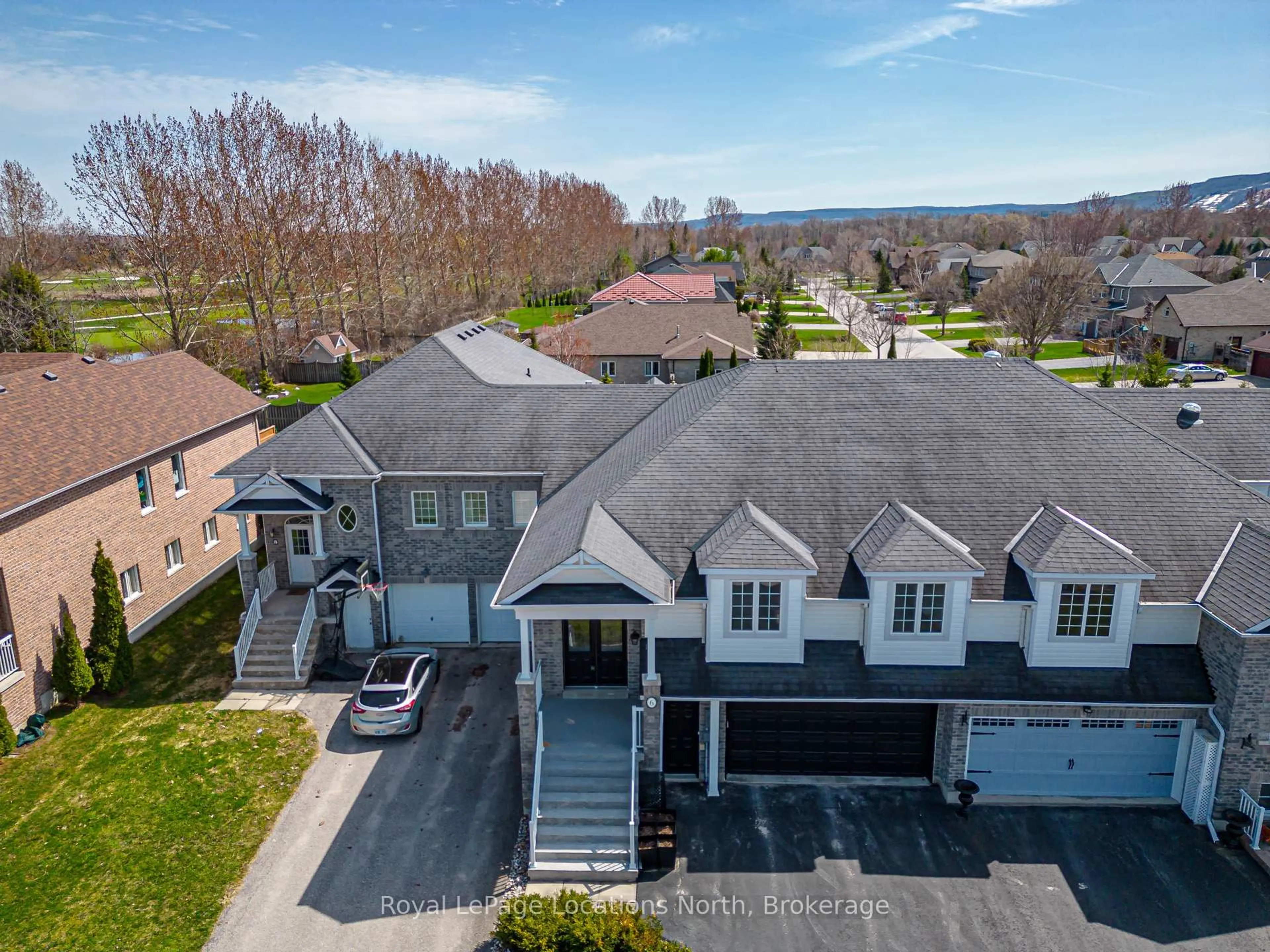 A pic from outside/outdoor area/front of a property/back of a property/a pic from drone, street for 6 Thomas Dr, Collingwood Ontario L9Y 0A6