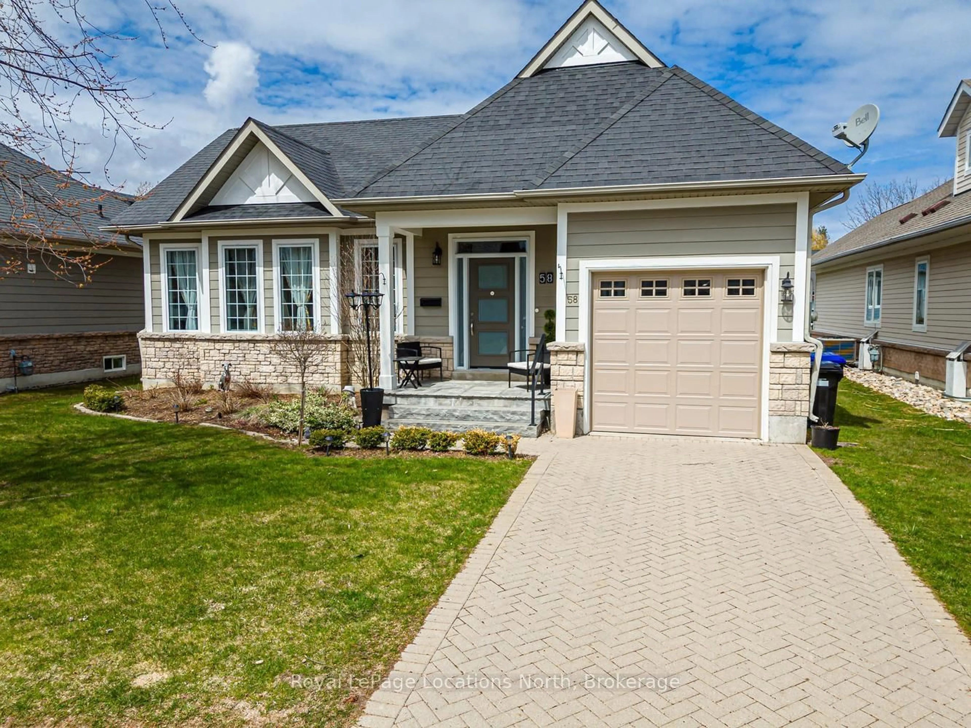 Home with brick exterior material, street for 58 CLUBHOUSE Dr, Collingwood Ontario L9Y 4Z6