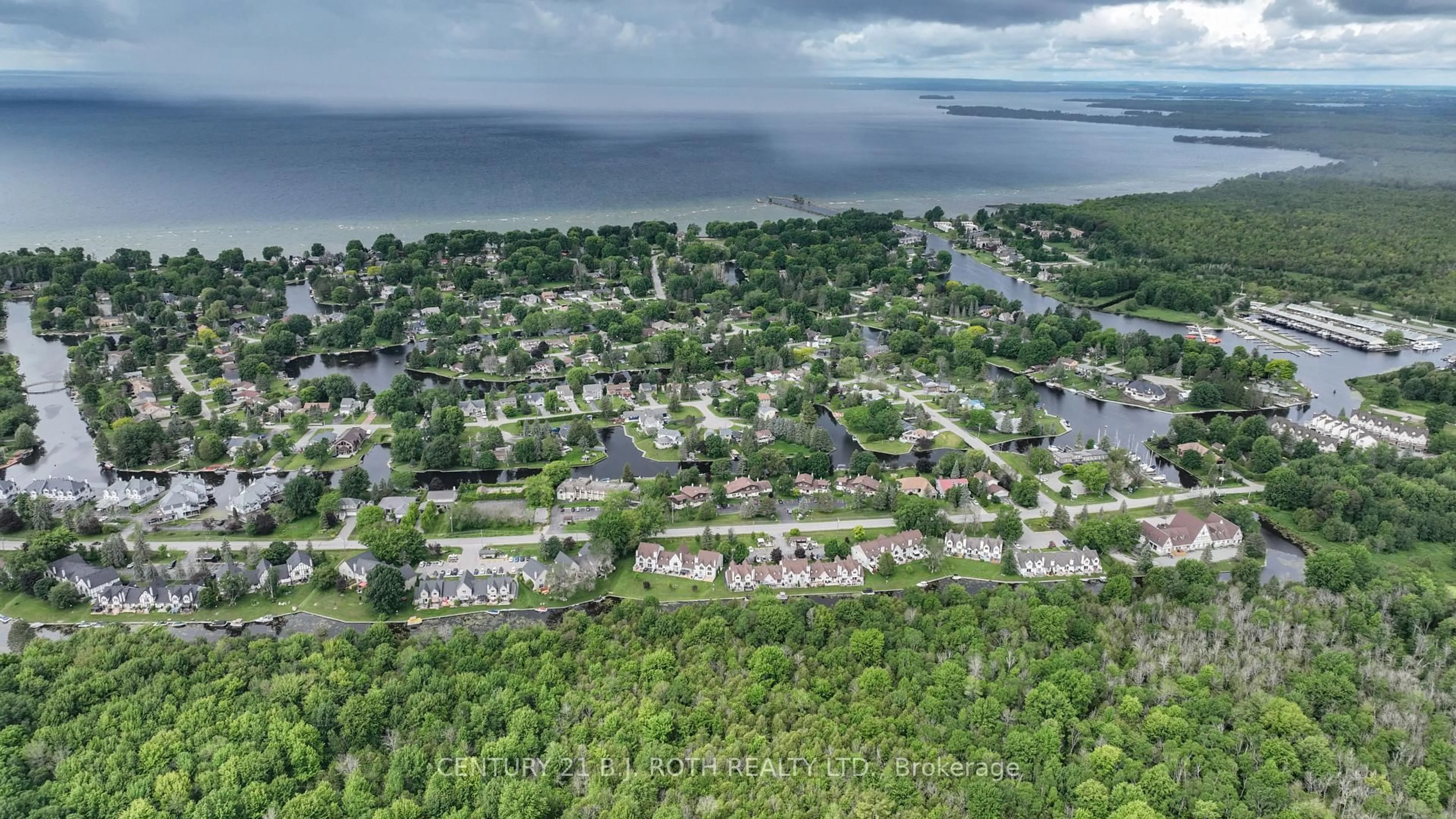 A pic from outside/outdoor area/front of a property/back of a property/a pic from drone, water/lake/river/ocean view for 71 Laguna Pkwy #18, Ramara Ontario L0K 1B0