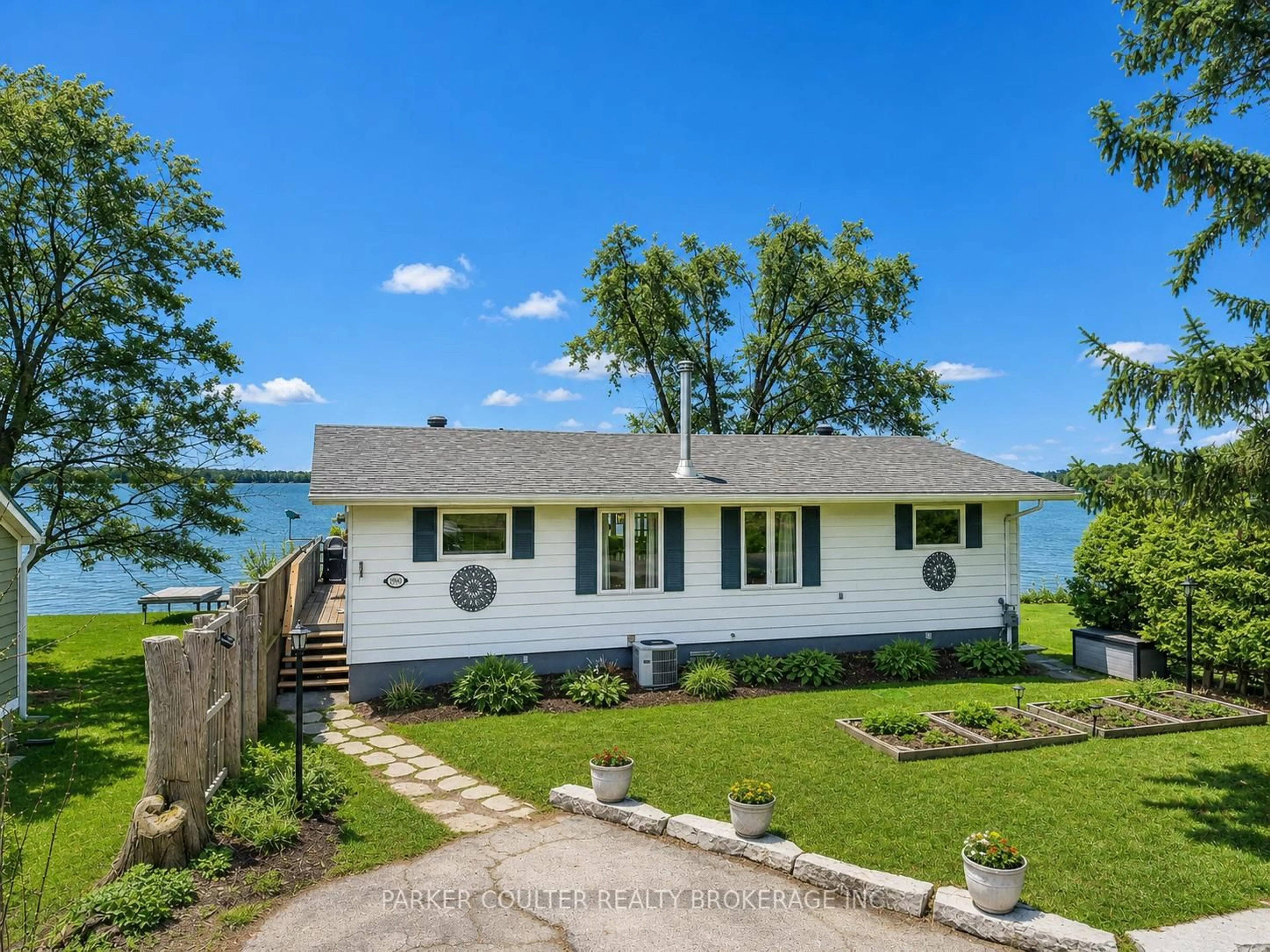 A pic from outside/outdoor area/front of a property/back of a property/a pic from drone, water/lake/river/ocean view for 1909 Woods Bay Rd, Severn Ontario L3V 0V7