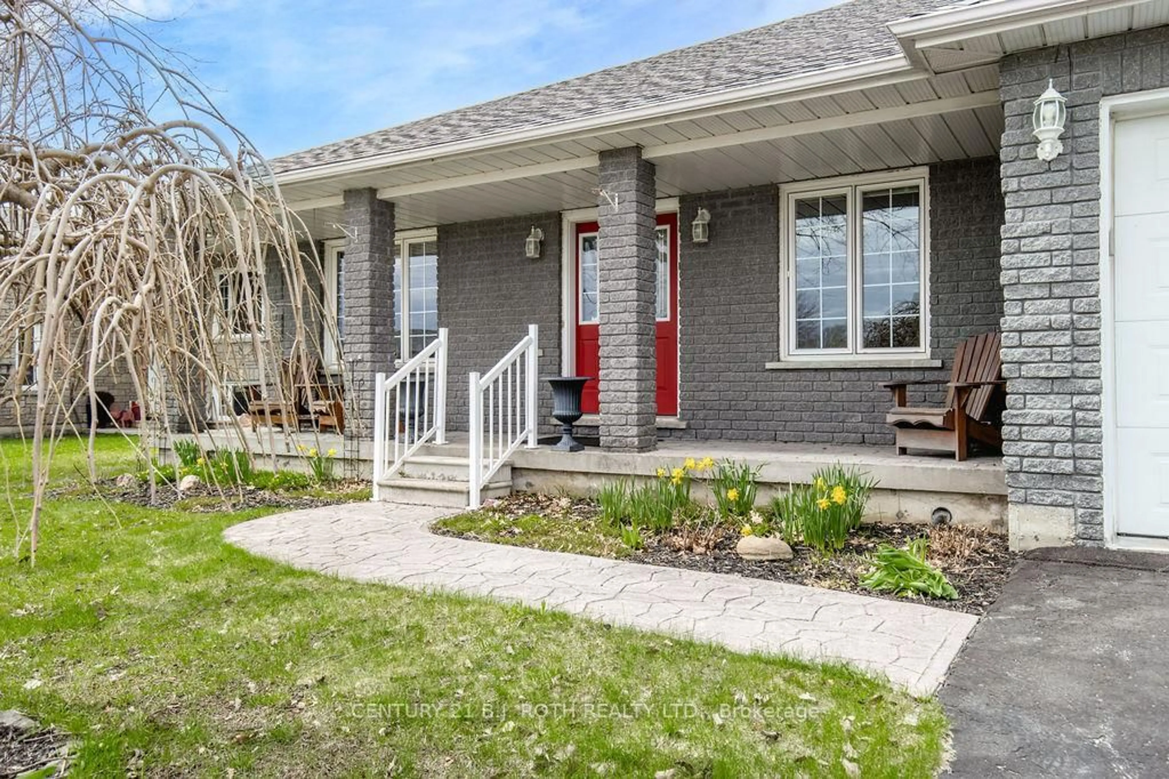 Home with brick exterior material, street for 12 Graham St, Springwater Ontario L0L 1P0
