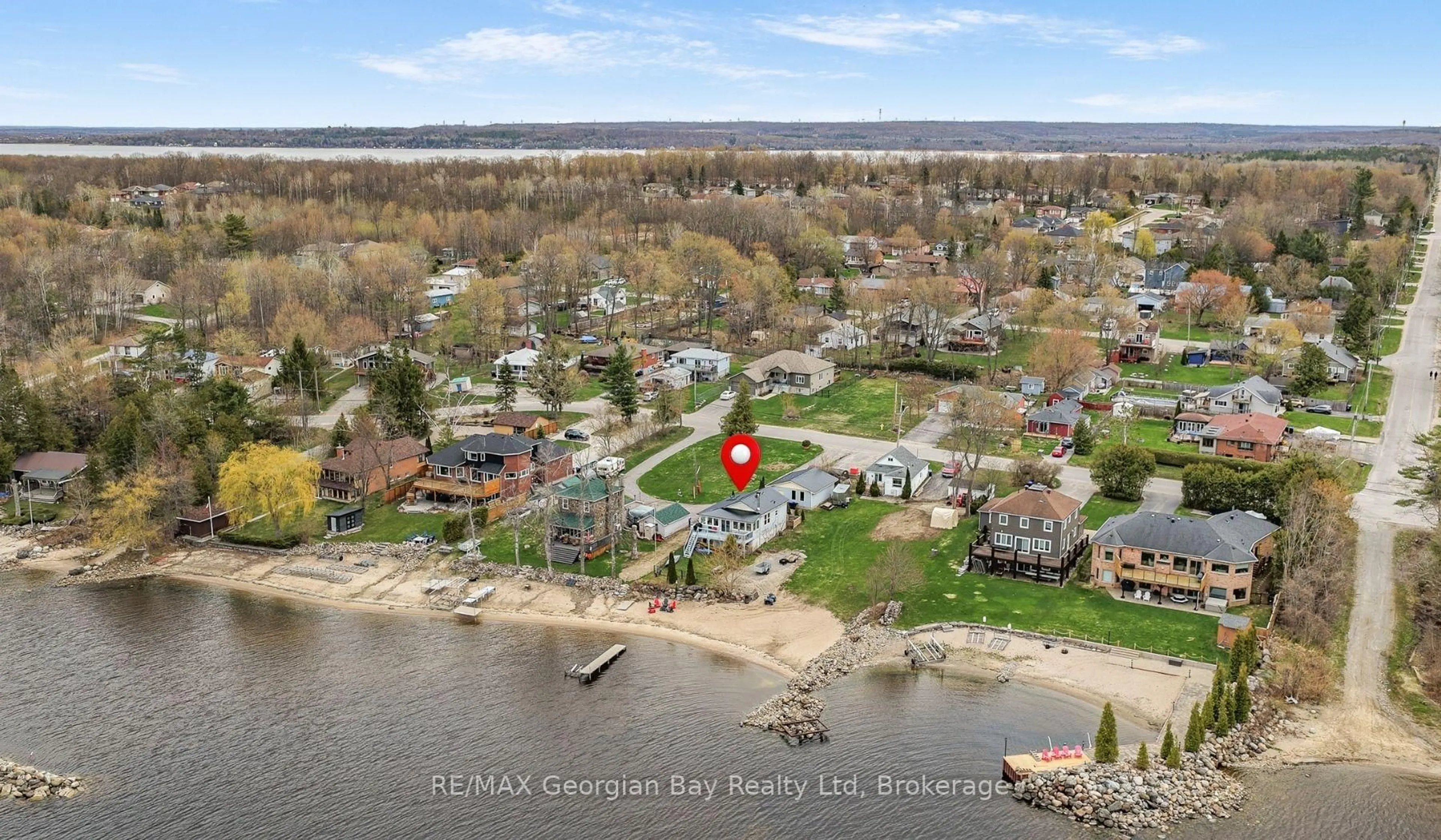 A pic from outside/outdoor area/front of a property/back of a property/a pic from drone, water/lake/river/ocean view for 12 Robins Point Rd, Tay Ontario L0K 2A0