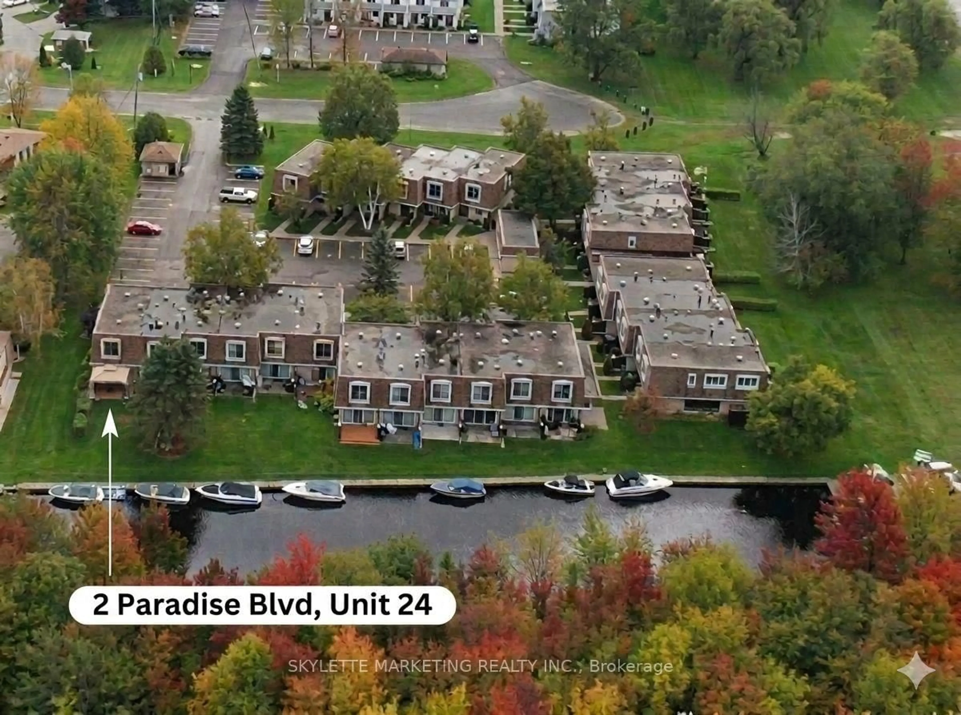 A pic from outside/outdoor area/front of a property/back of a property/a pic from drone, unknown for 2 Paradise Blvd #24, Ramara Ontario L0K 1B0