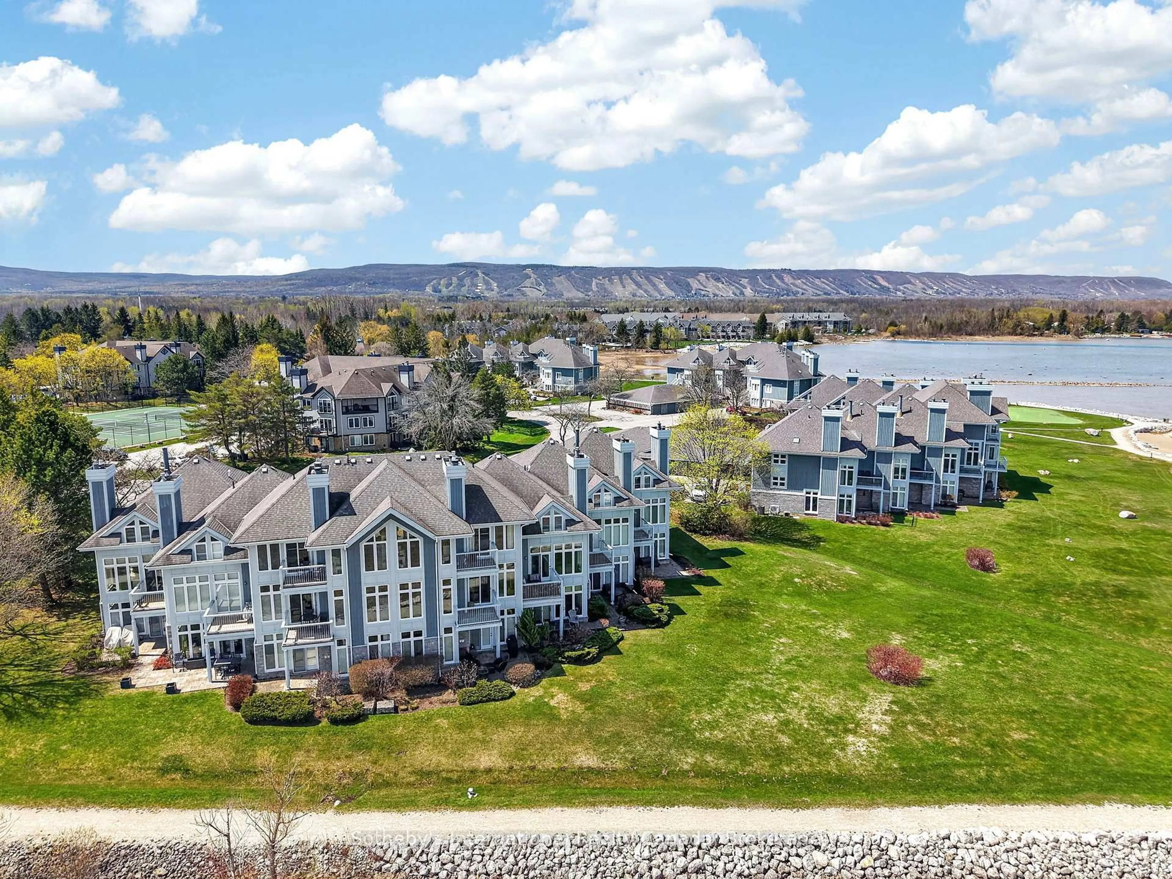A pic from outside/outdoor area/front of a property/back of a property/a pic from drone, water/lake/river/ocean view for 843 Suncrest Circ, Collingwood Ontario L9Y 5C7