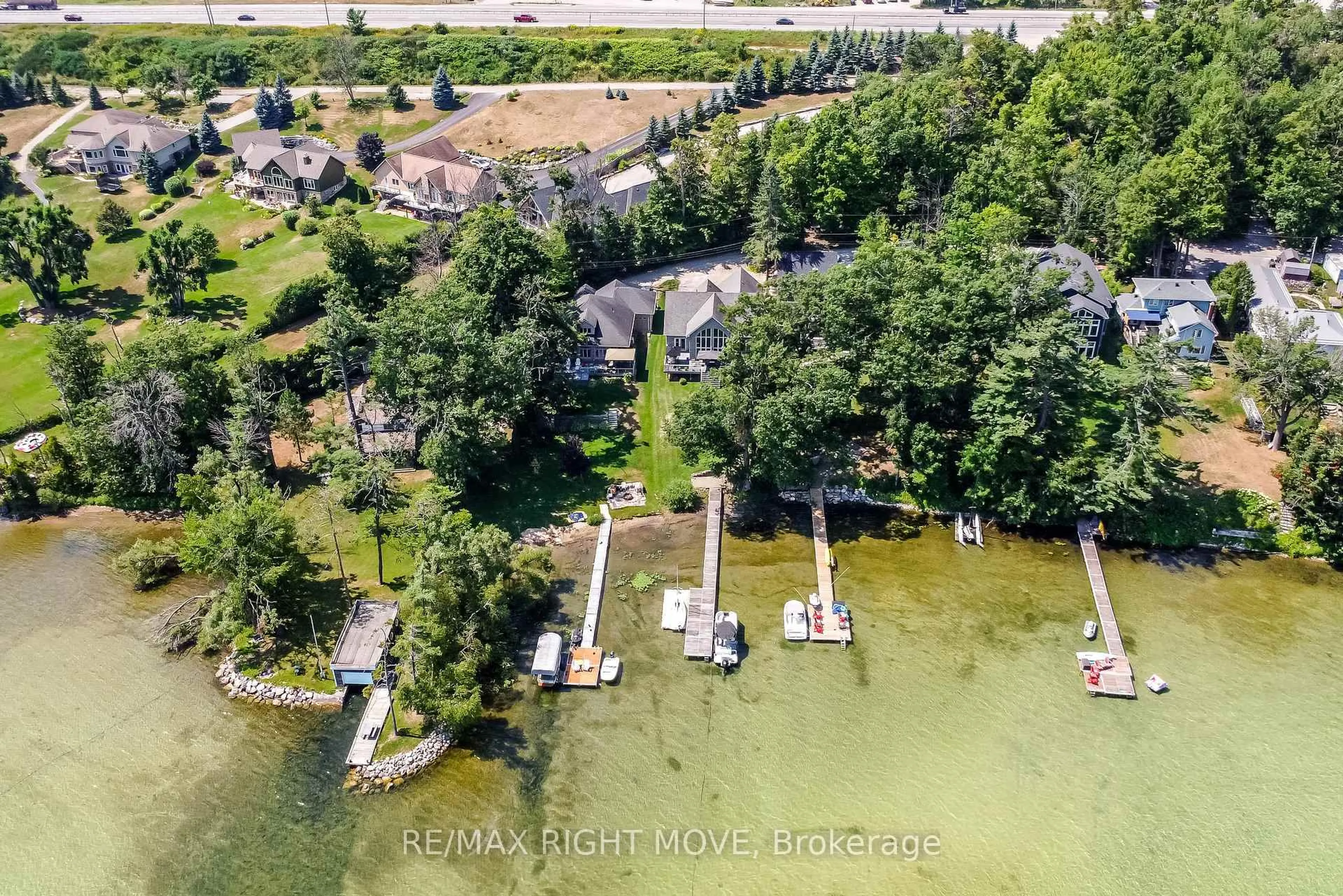 A pic from outside/outdoor area/front of a property/back of a property/a pic from drone, water/lake/river/ocean view for 1756 Bay Park Rd, Severn Ontario L3V 0V7