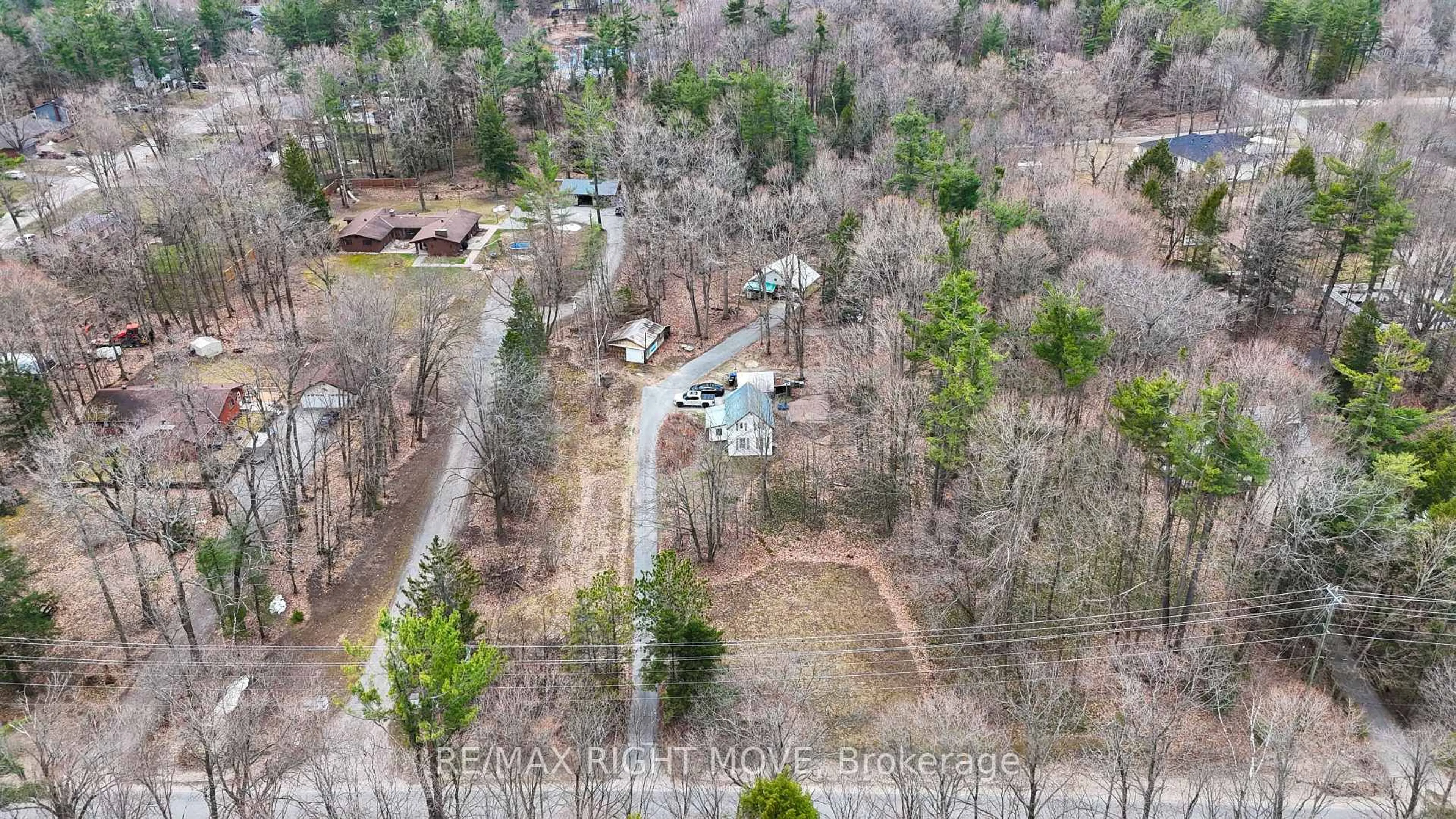A pic from outside/outdoor area/front of a property/back of a property/a pic from drone, forest/trees view for 4124 Wainman Line, Severn Ontario L3V 7C4